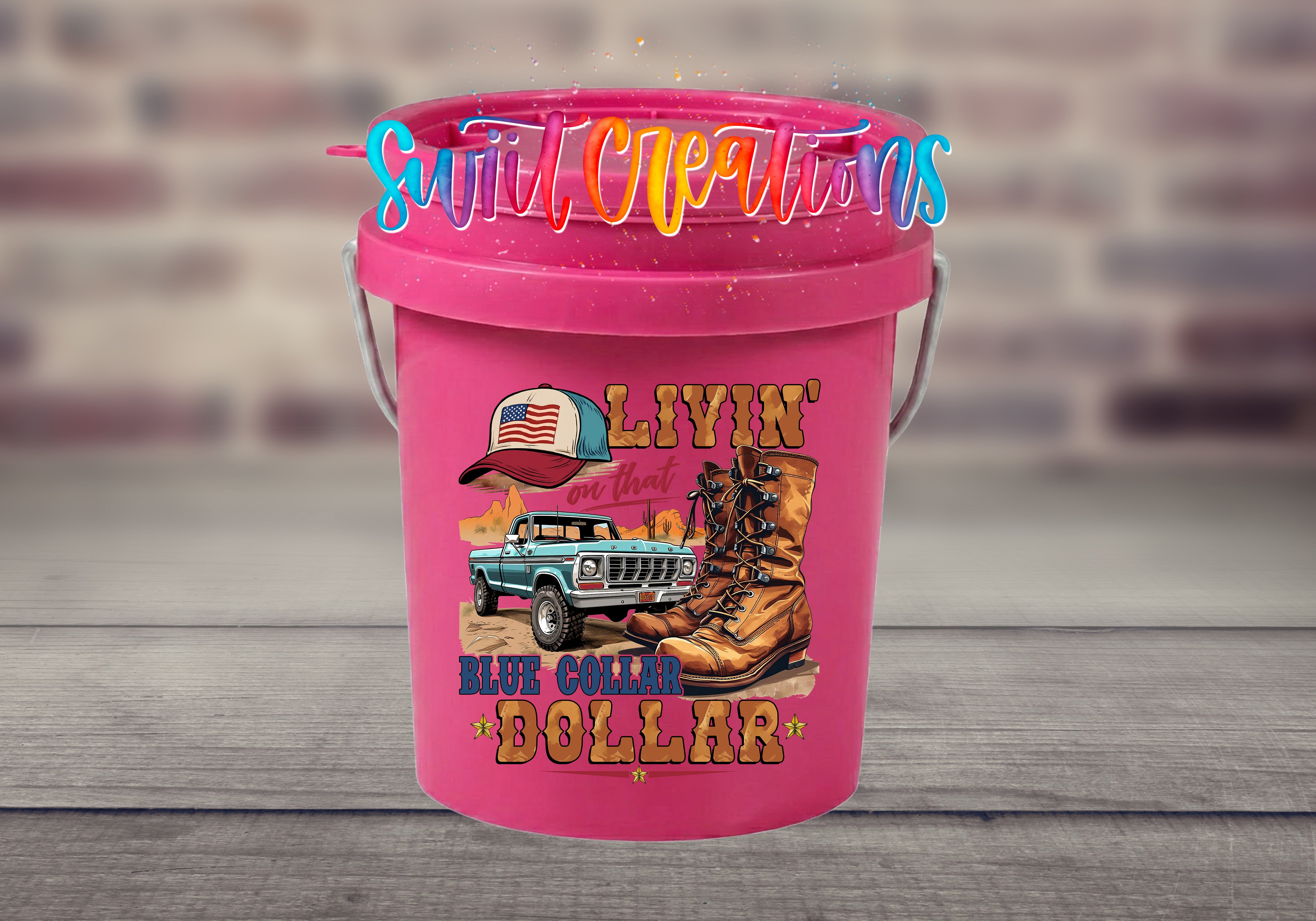 A pink bucket with a truck and boots printed on it, along with the text "LIVIN' on that truck" and "BLUE COLLAR DOLLAR".