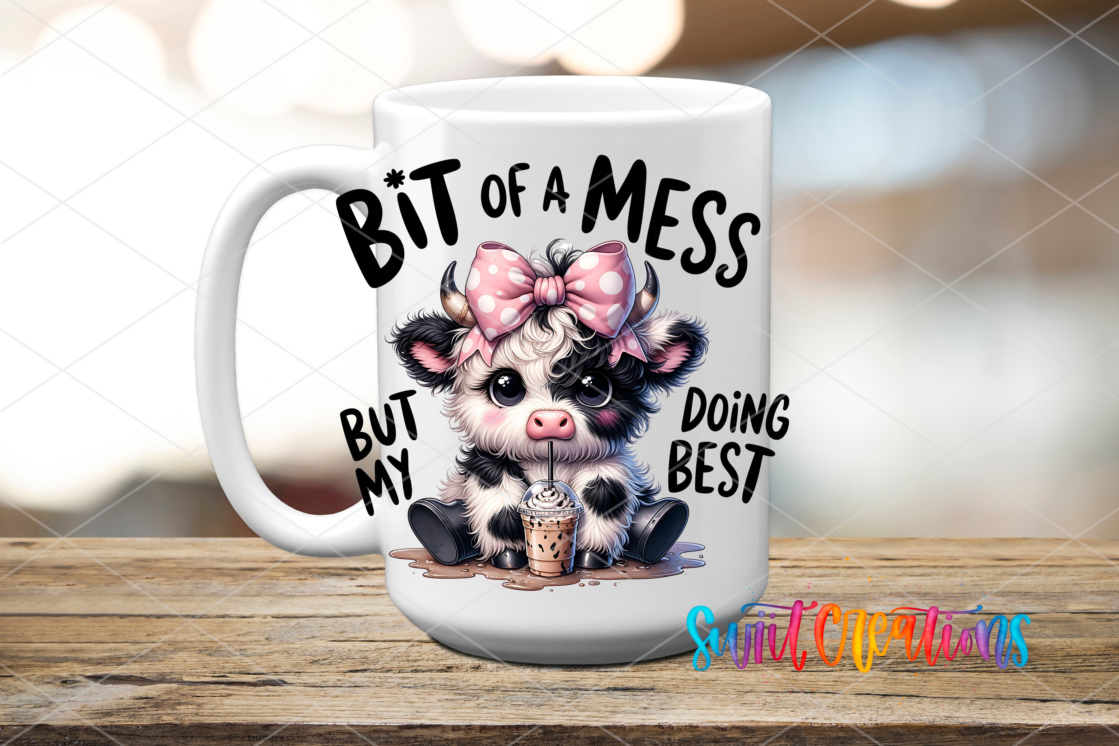 A white mug with a cartoon cow and the text "BIT OF A MESS BUT MY DOING BEST" printed on it.