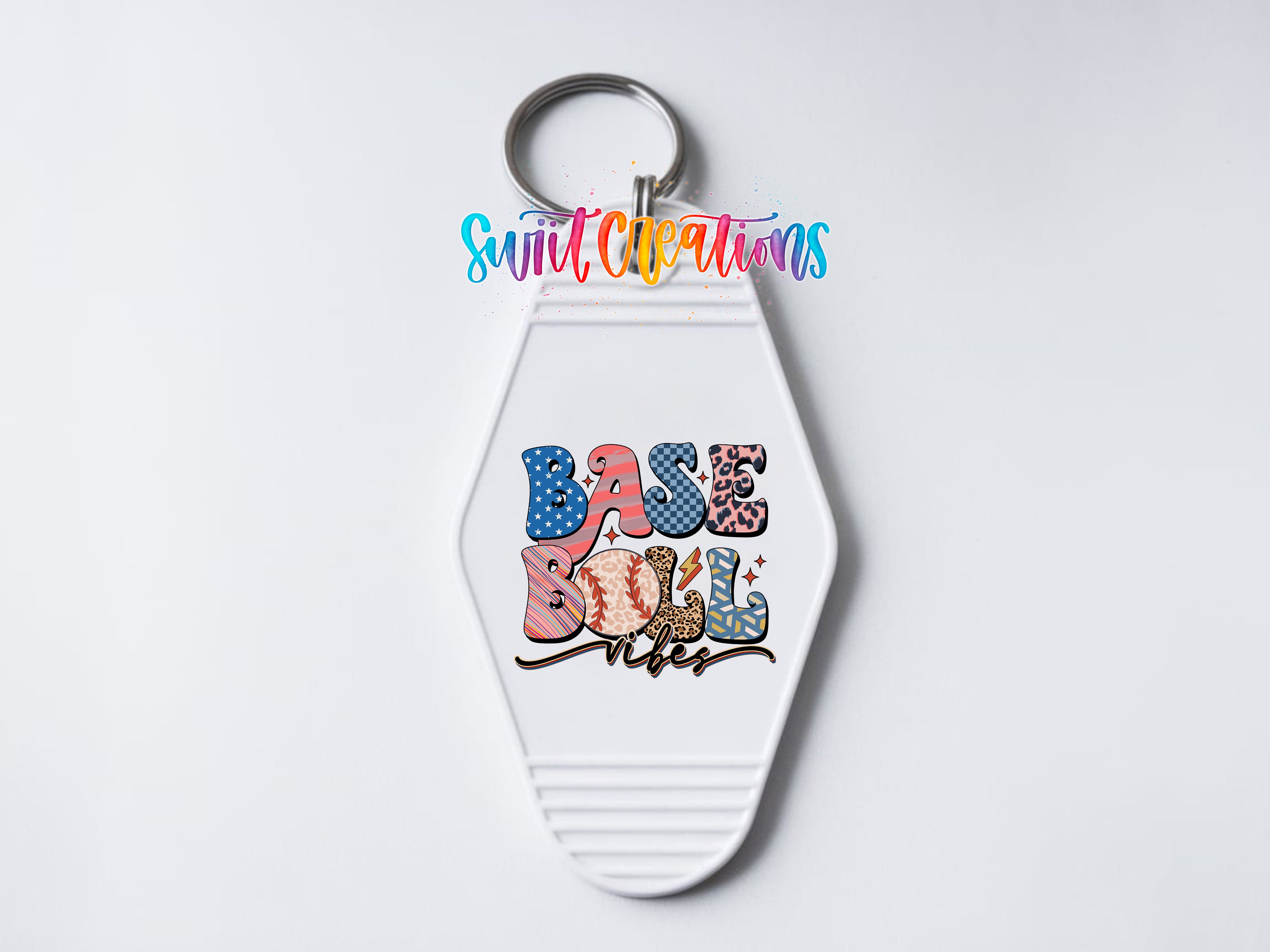 A keychain with the text "Base Ball" printed on it.