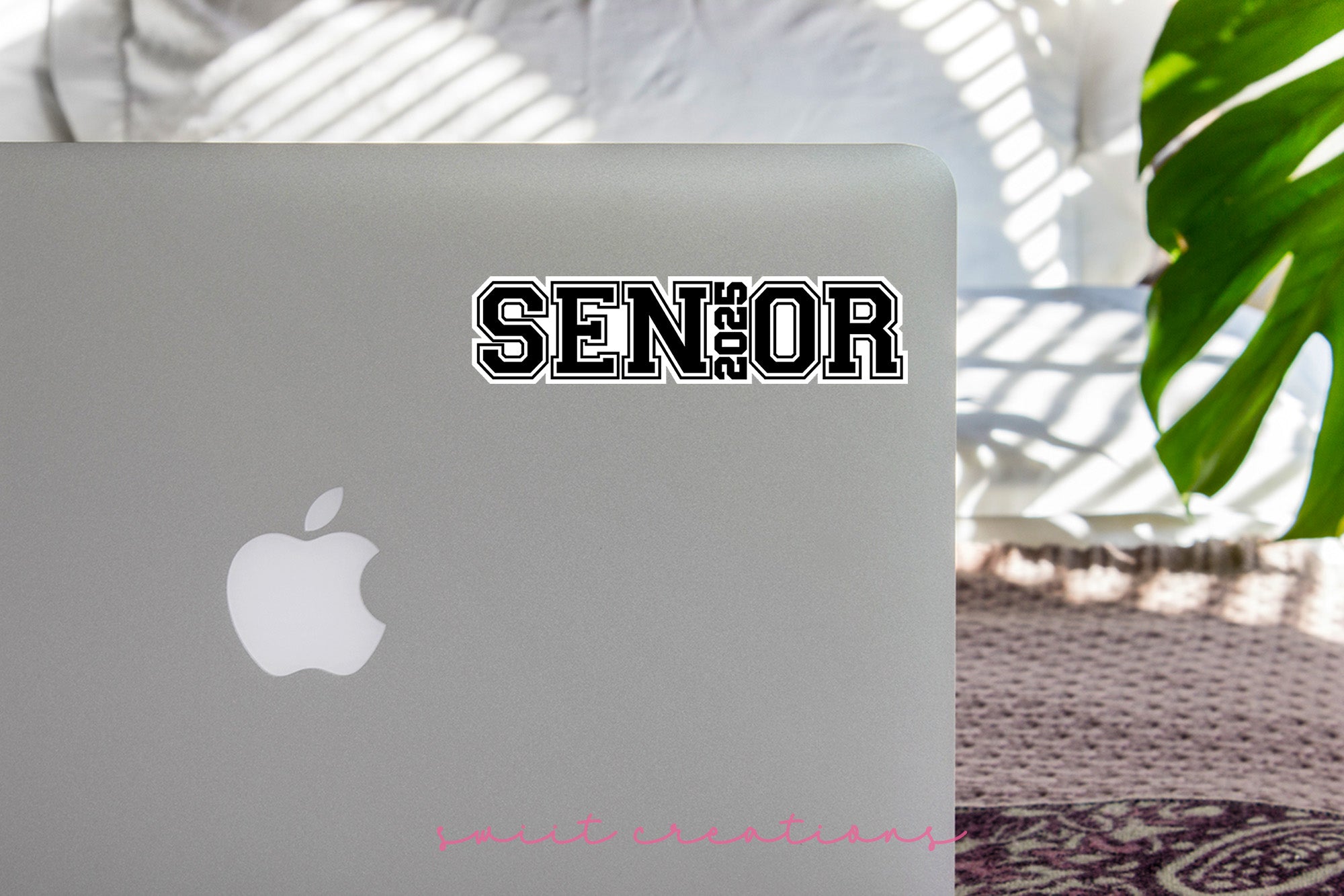 a laptop computer sitting on top of a table