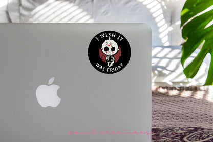 a laptop with a sticker of a skeleton on it