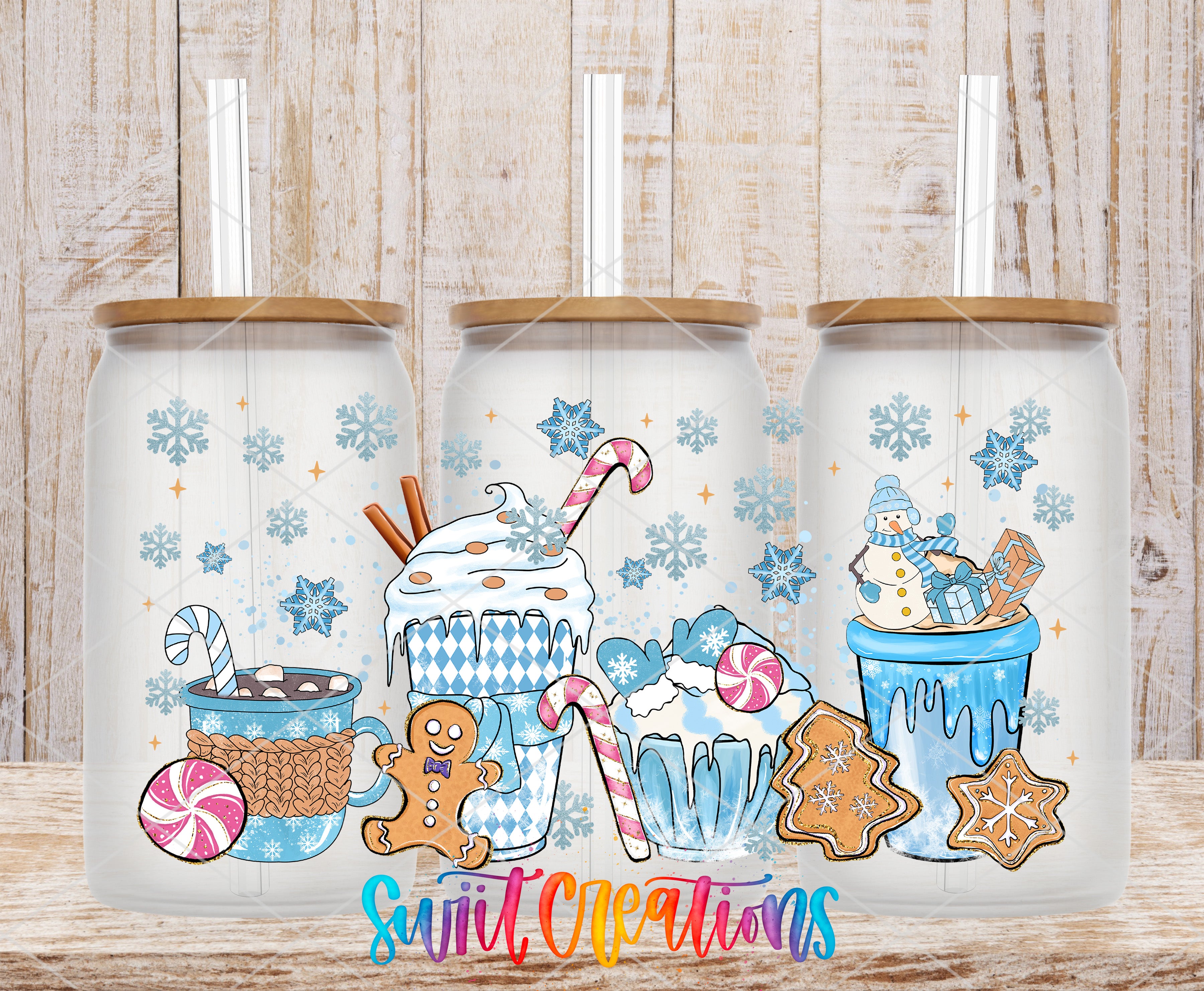 A collection of three glass tumblers with various winter-themed illustrations, including snowflakes, gingerbread cookies, hot chocolate, and a gingerbread man.