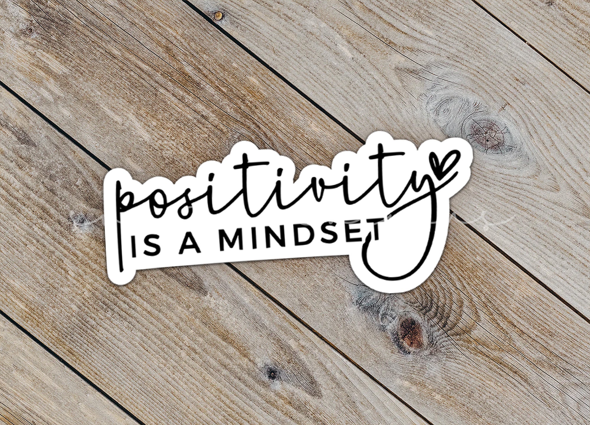 a sticker that says positivity is a mindset