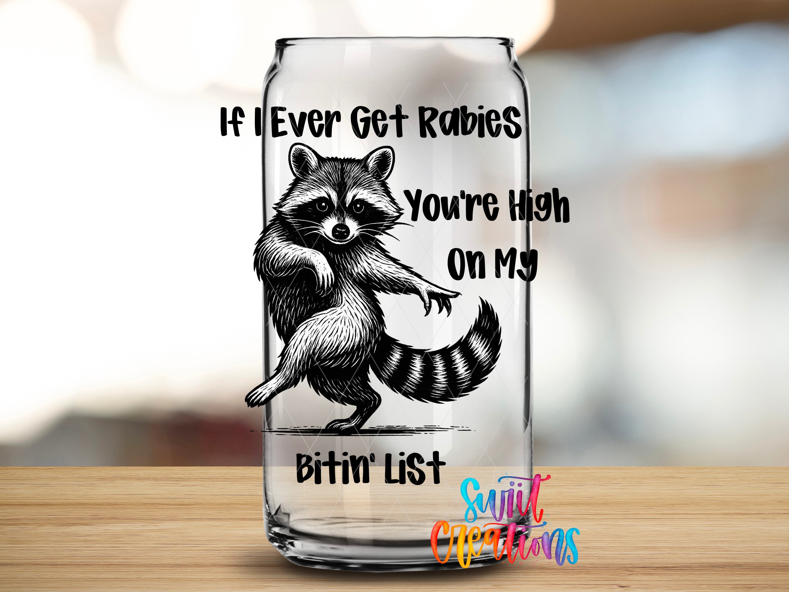 A raccoon standing on one leg inside a glass can with text on it.