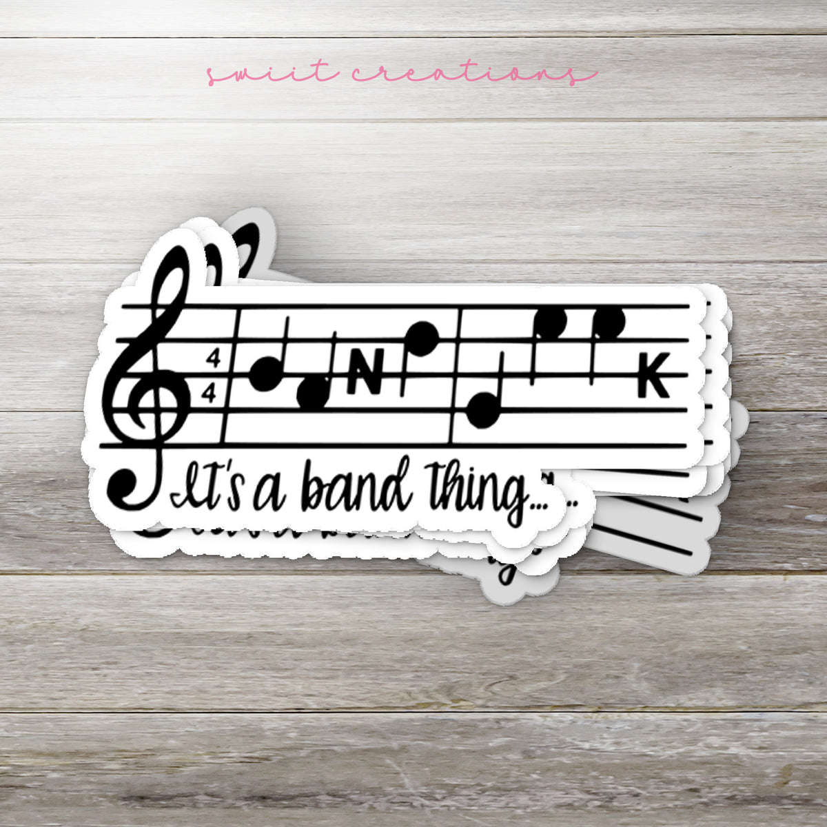 a pair of stickers that say it's a band thing