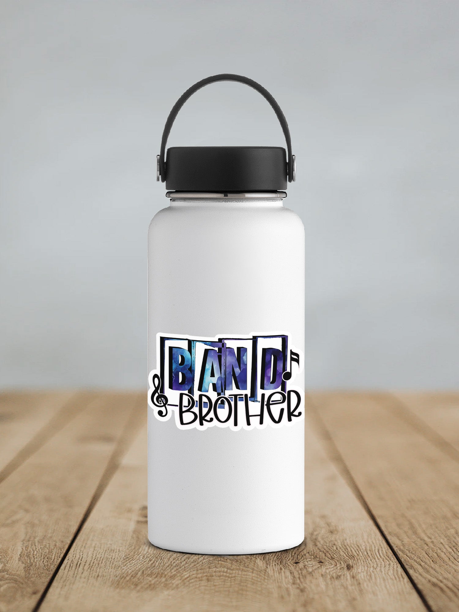 a white water bottle sitting on top of a wooden table