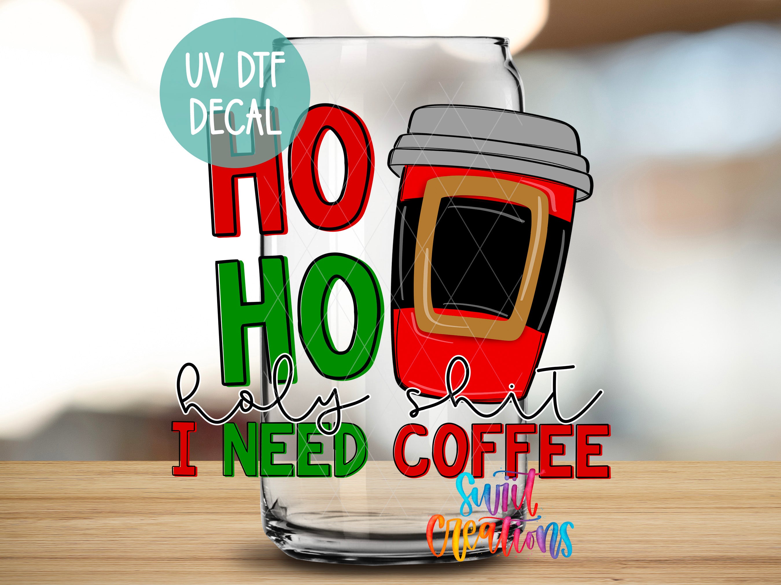 A glass mug with a coffee cup design, along with text that says "HOLY SHIT I NEED COFFEE" and "SMILE MORE CHRISTMAS" printed on it.