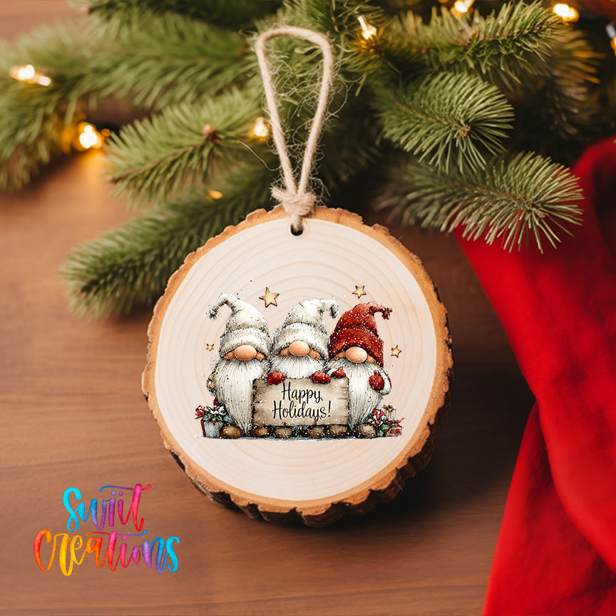 A wooden ornament with a gnome design and the text "Happy Holidays!" hanging on a Christmas tree.