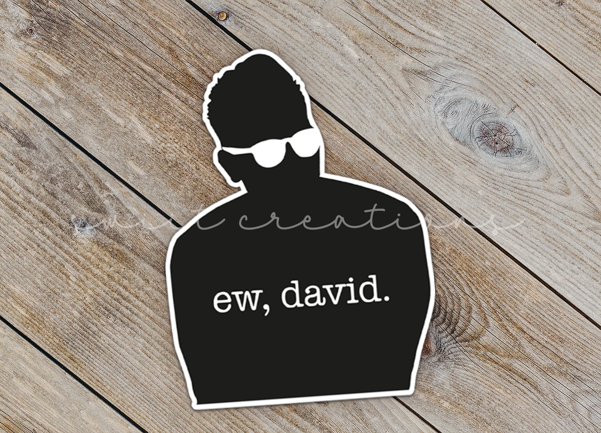 a sticker of a man with sunglasses on it