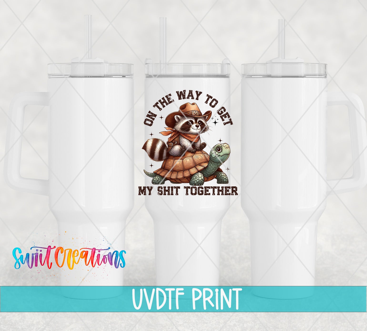 a white tumbler with a printed design on it, including a raccoon riding a turtle and the text "ON THE WAY TO GET MY SHIT TOGETHER".
