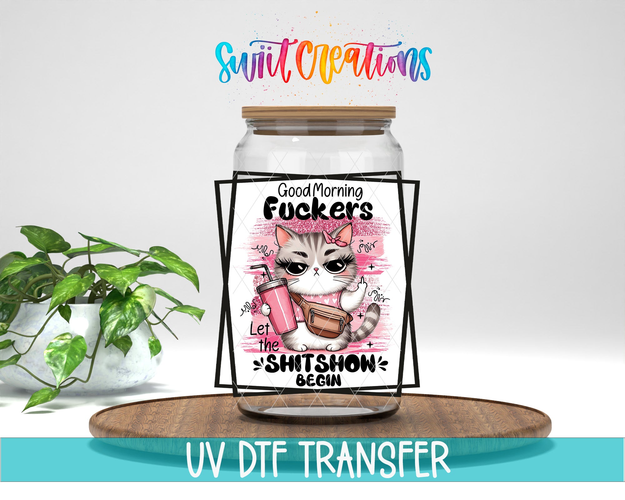 A jar with a label featuring a cat and the text "Good Morning FUCKERS Let the SHIT SHOW Begin" is displayed on a wooden tray.