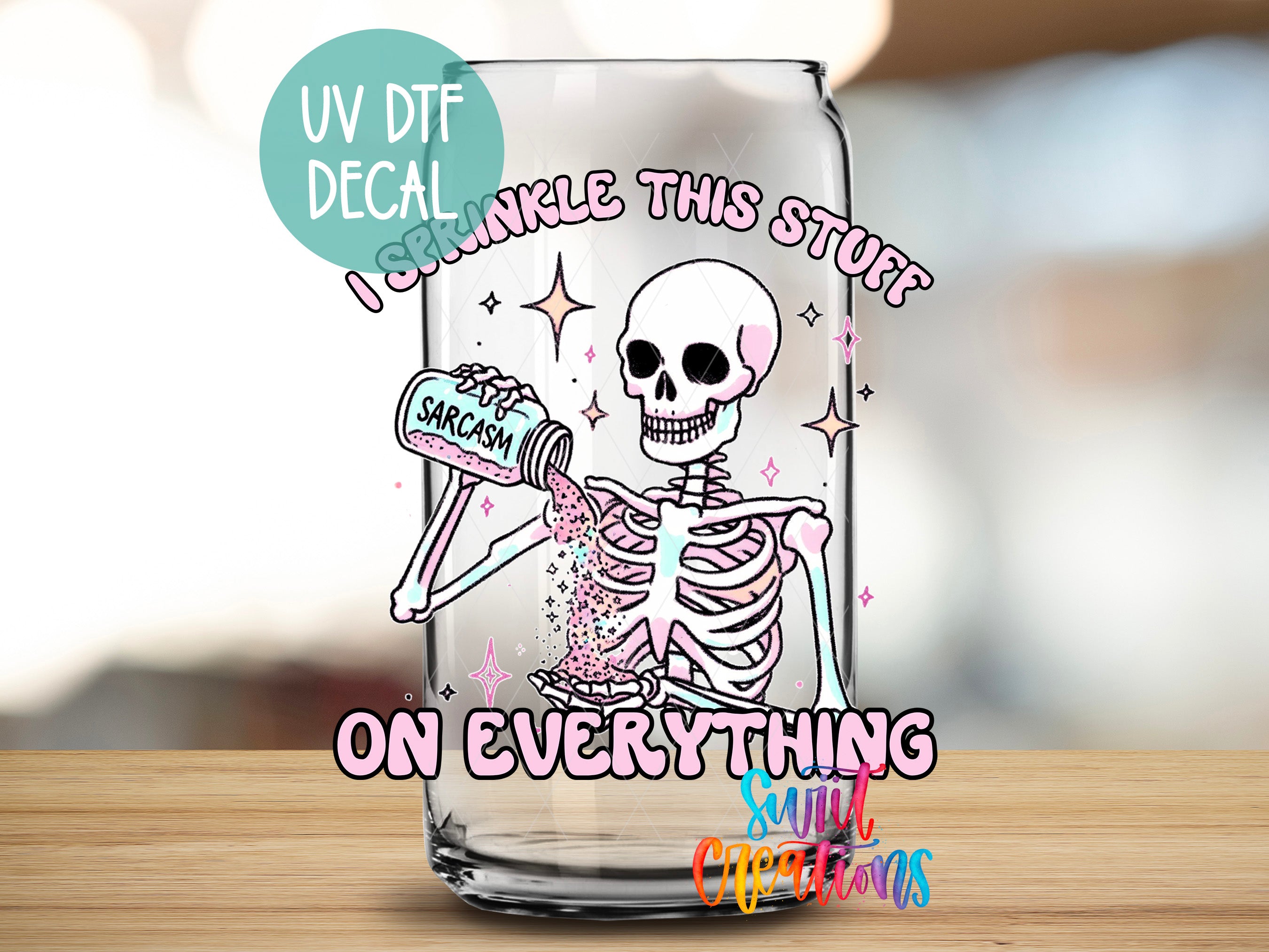 a glass with a skeleton holding a can of soda