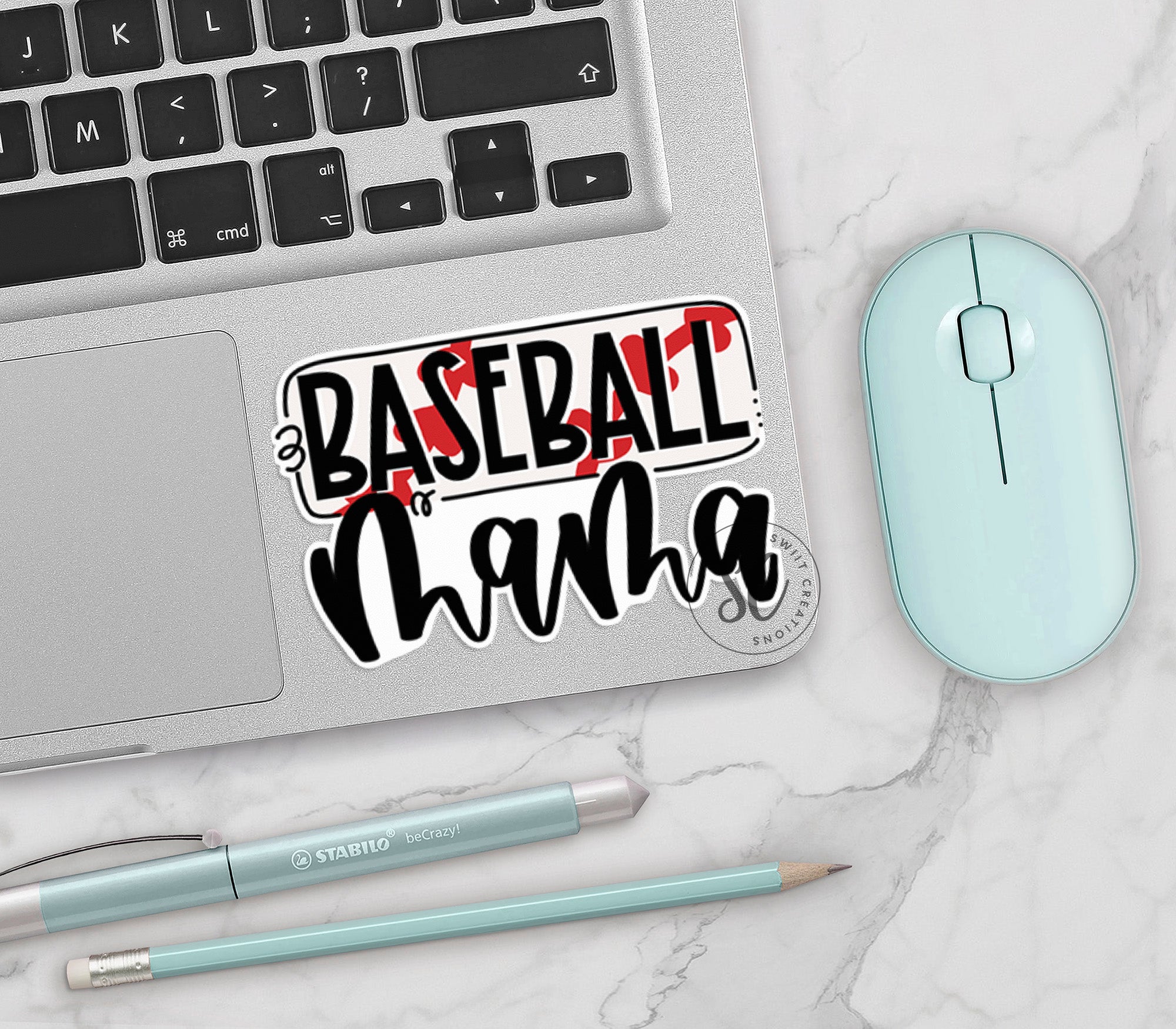 a laptop with a sticker that says baseball mama
