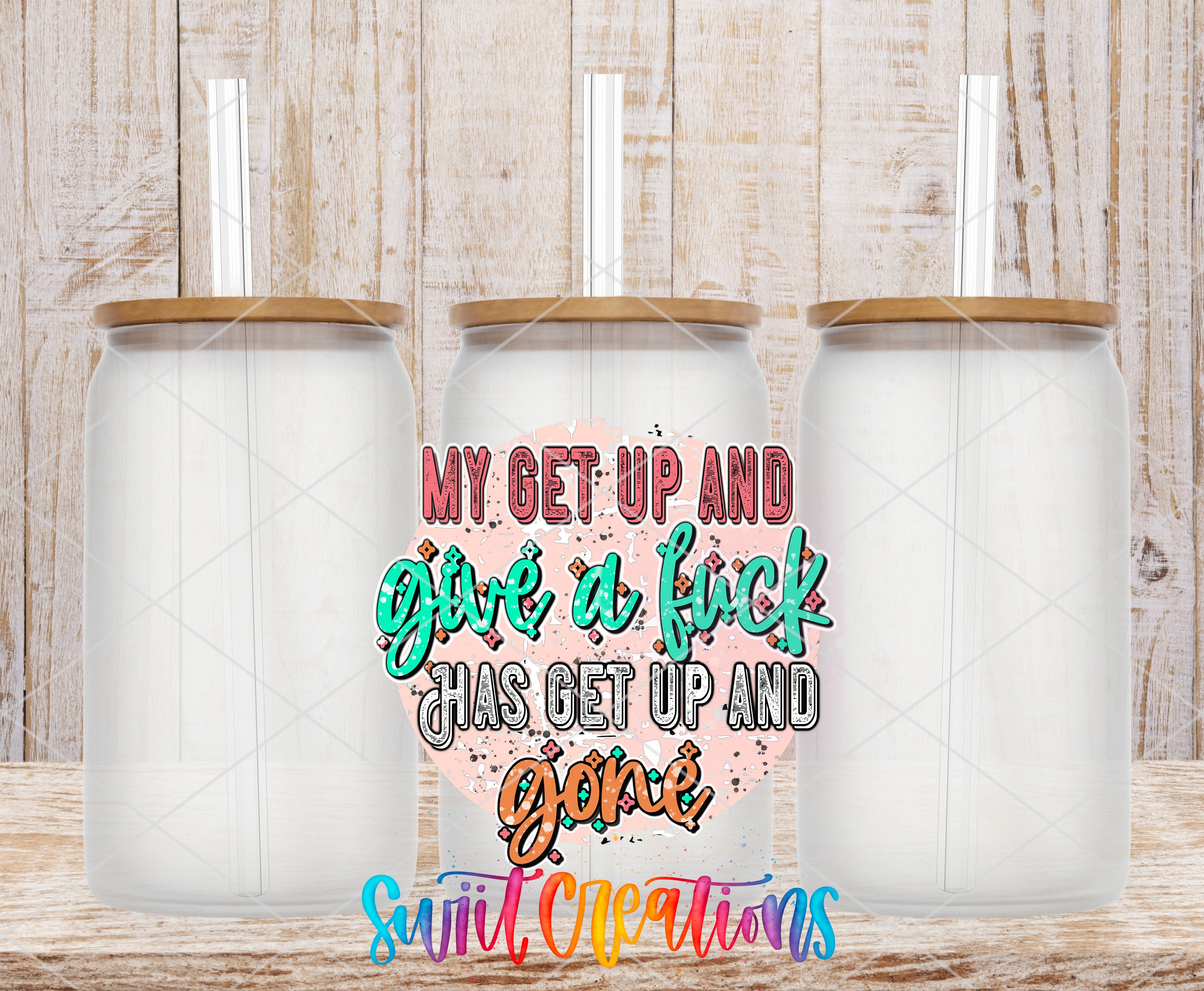 three transparent glass jars with lids, arranged in a row against a wooden background. In the center of the image, there is a colorful text that reads "MY GET UP AND GIVE IT F*CK HAS GET UP AND GONE".
