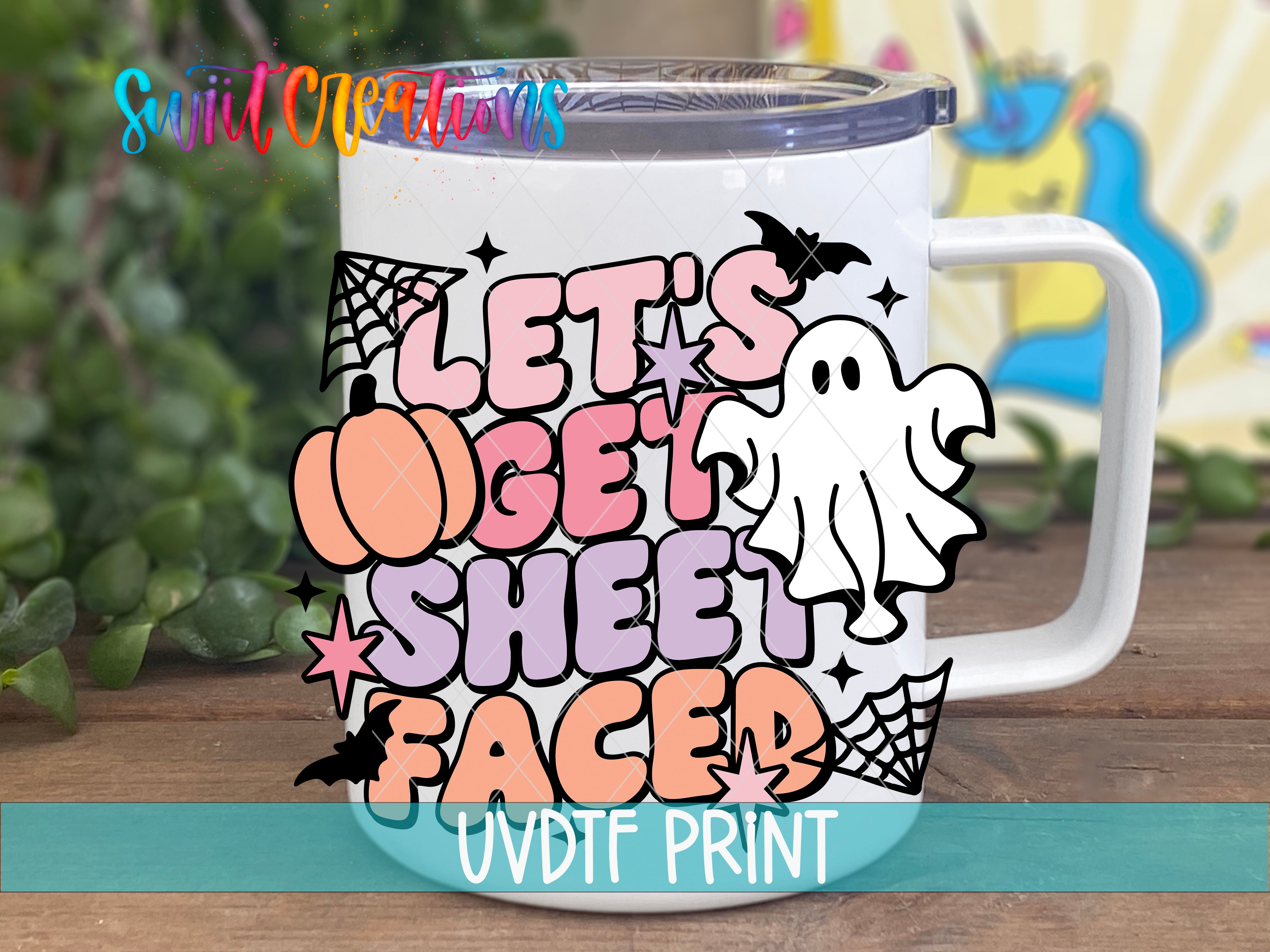 A mug with a Halloween-themed design featuring a ghost, pumpkin, spider web, and the text "Let's get sheet face" in a playful and spooky style.