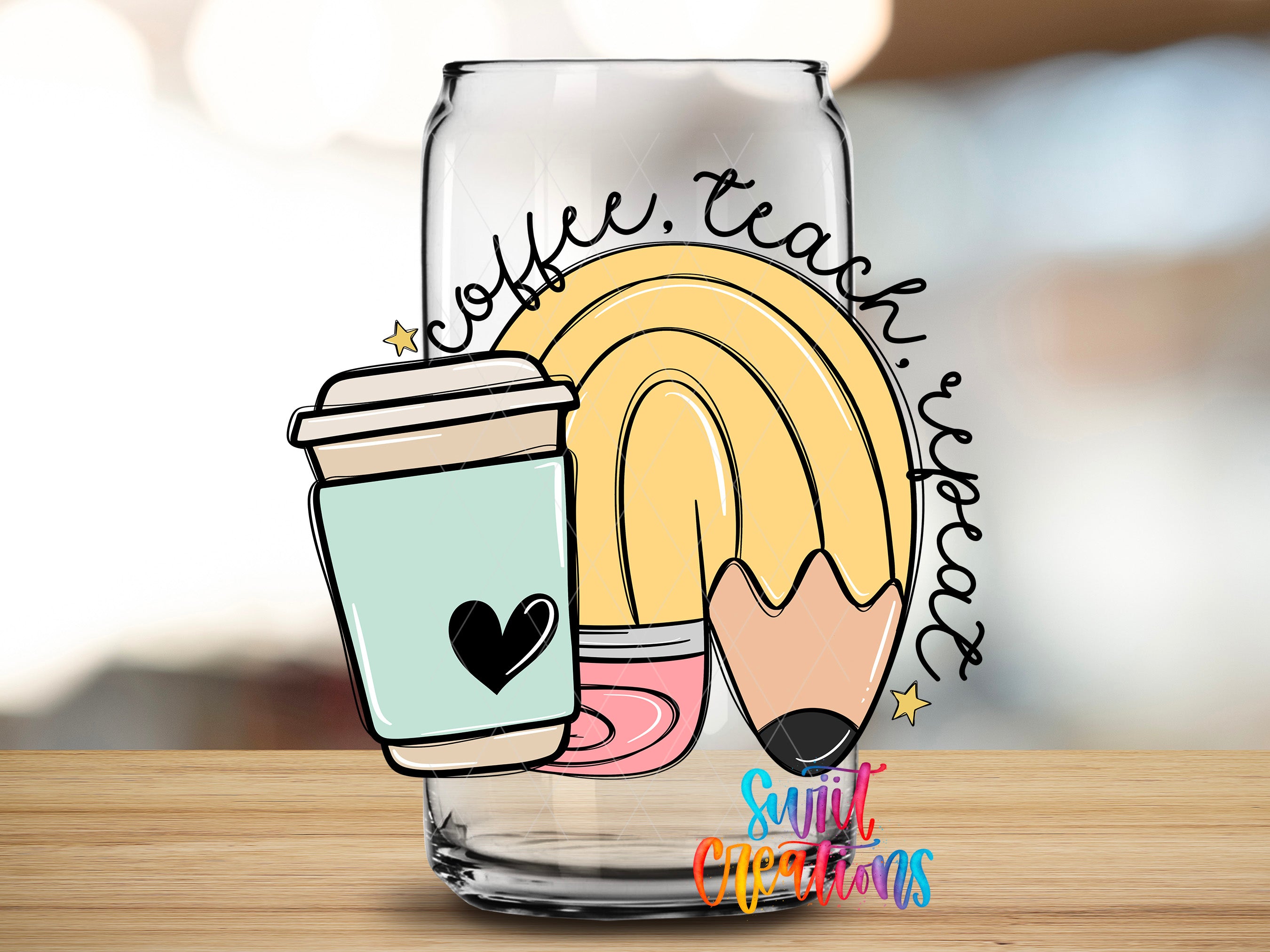 A glass mug with a heart symbol and a pencil, along with the text "coffee, teach, repeat" written on it, is displayed on a wooden surface.