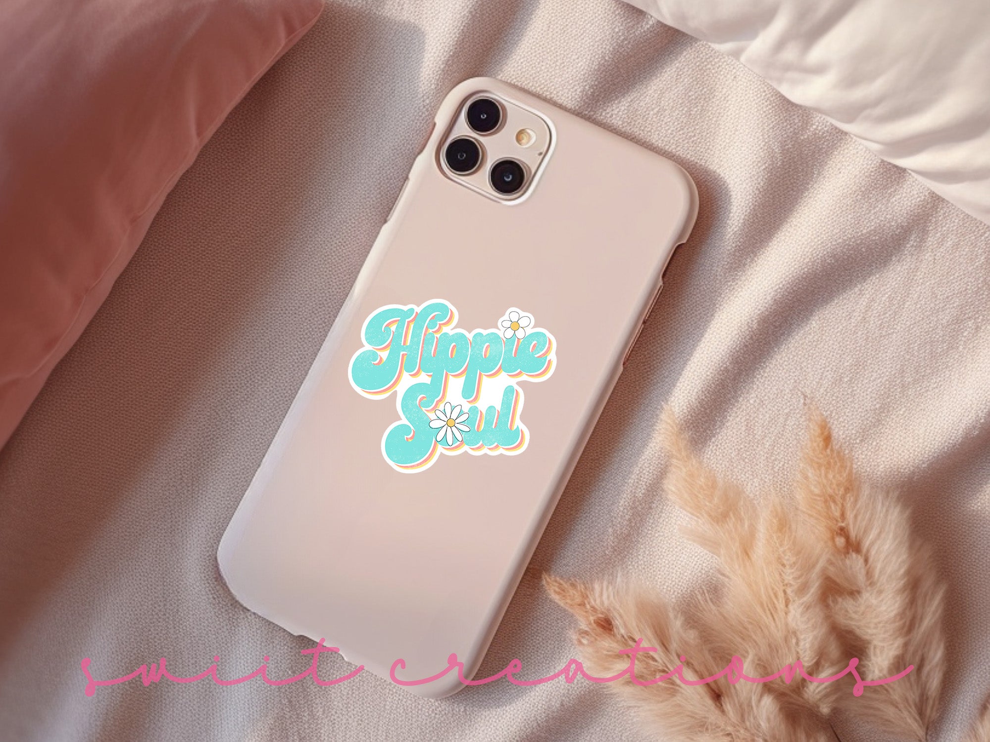 a phone case sitting on top of a bed
