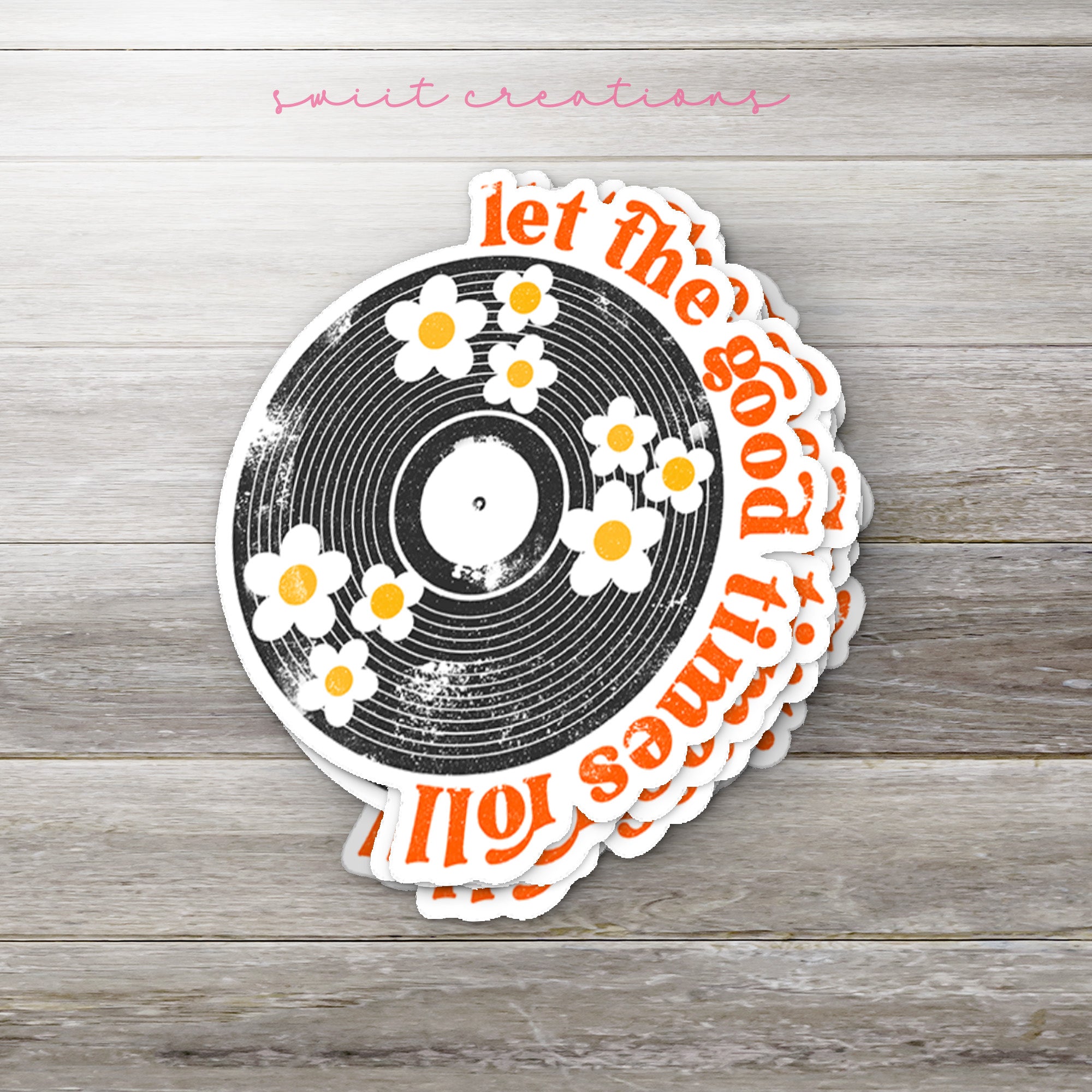 an orange and white sticker with a record on it