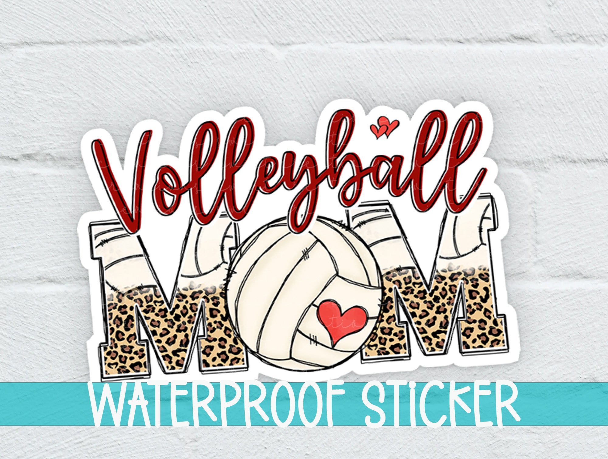a volleyball mom sticker on a white brick wall