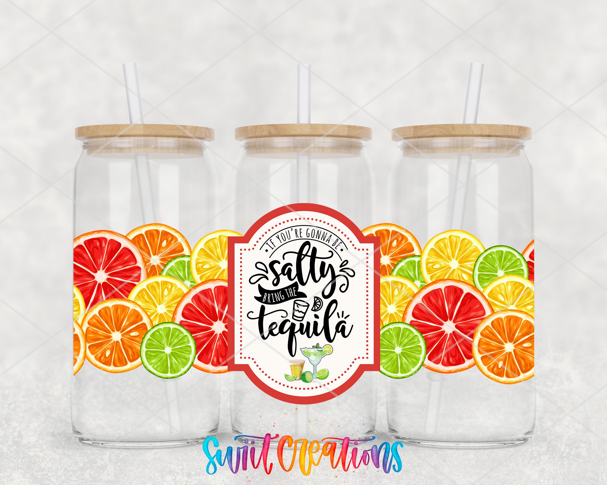 A collage of three glass jars with wooden lids, each filled with colorful slices of citrus fruit. The jars have straws on top. The central jar has a label that reads "You're a tequila lover, you're a tequila lover, you're a tequila lover".
