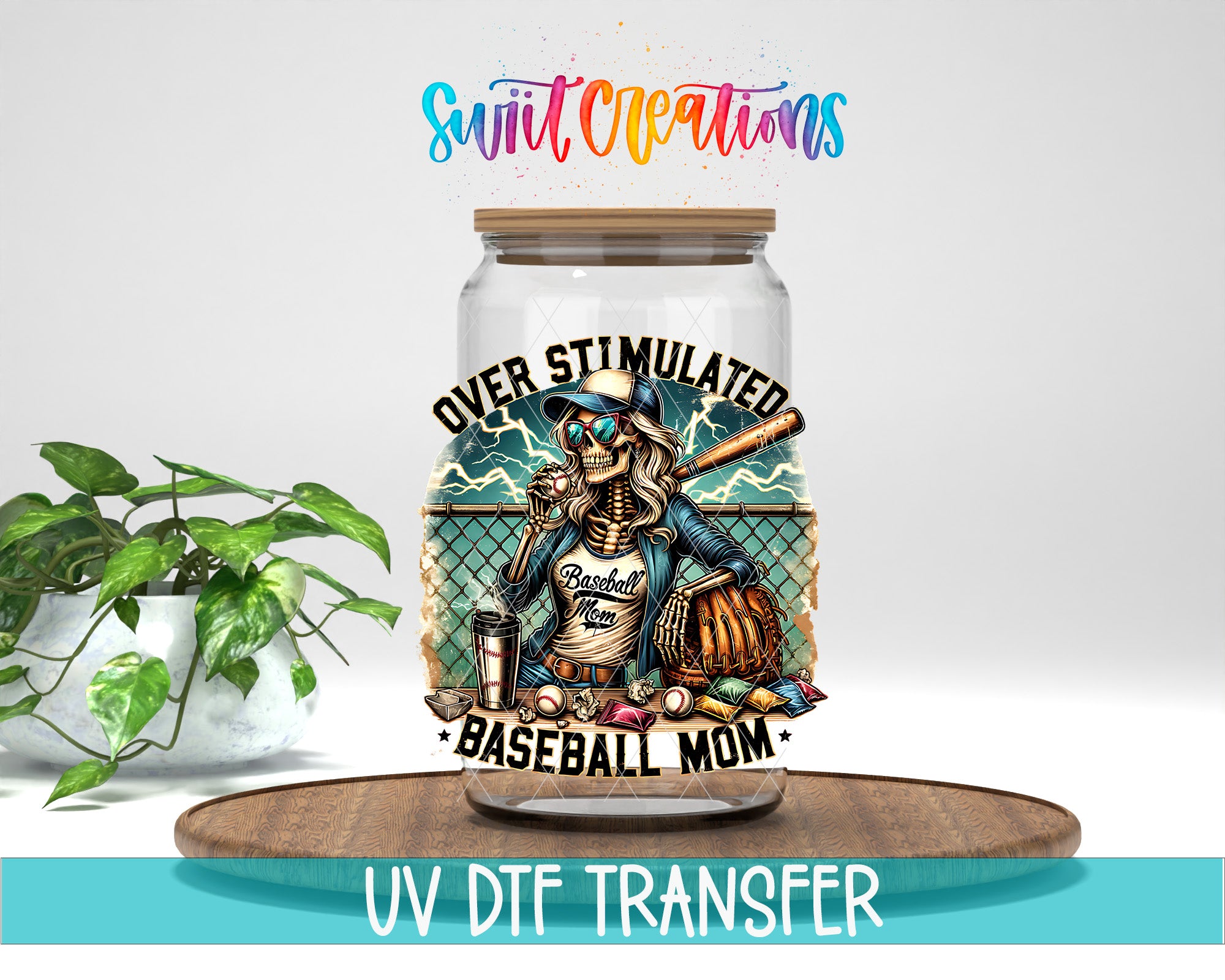 a glass jar with a baseball-themed design, including a skeleton wearing a baseball cap and holding a baseball bat. The jar is placed on a wooden surface, and there is a potted plant in the background.