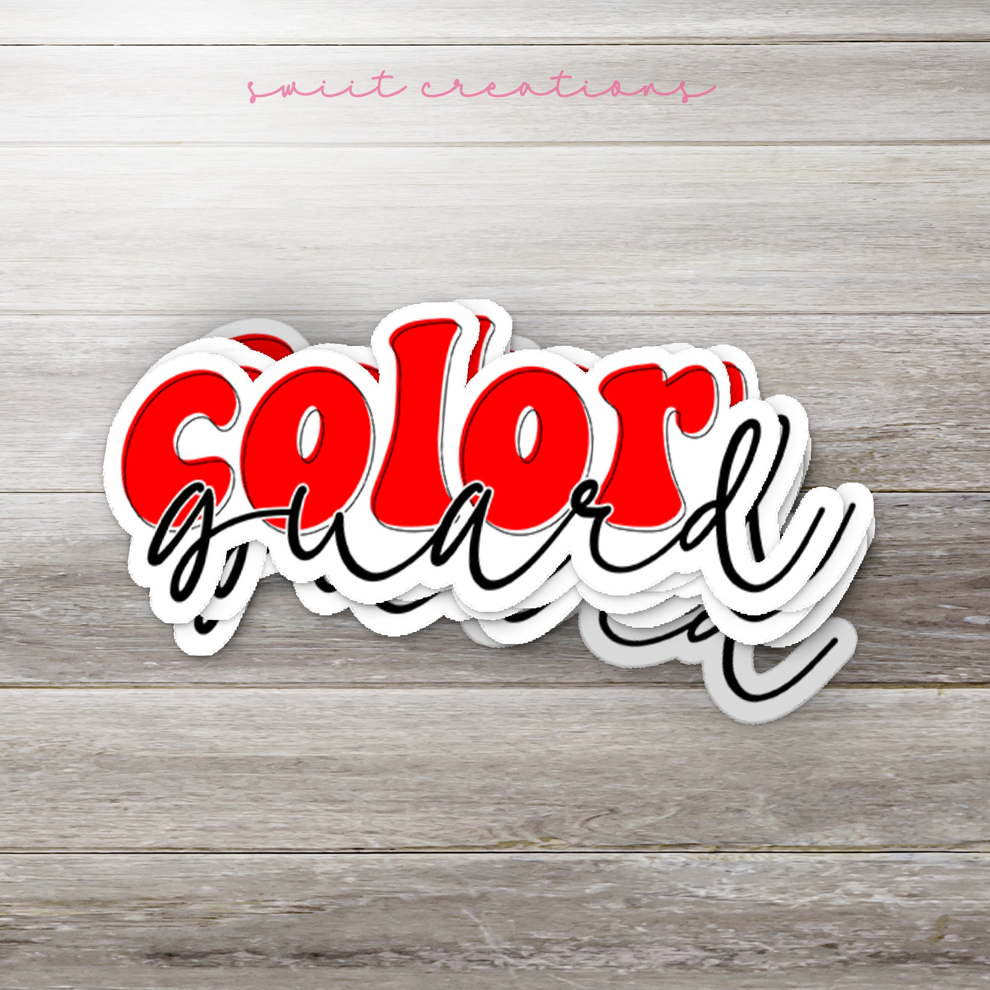 a sticker with the word color is on a wooden surface