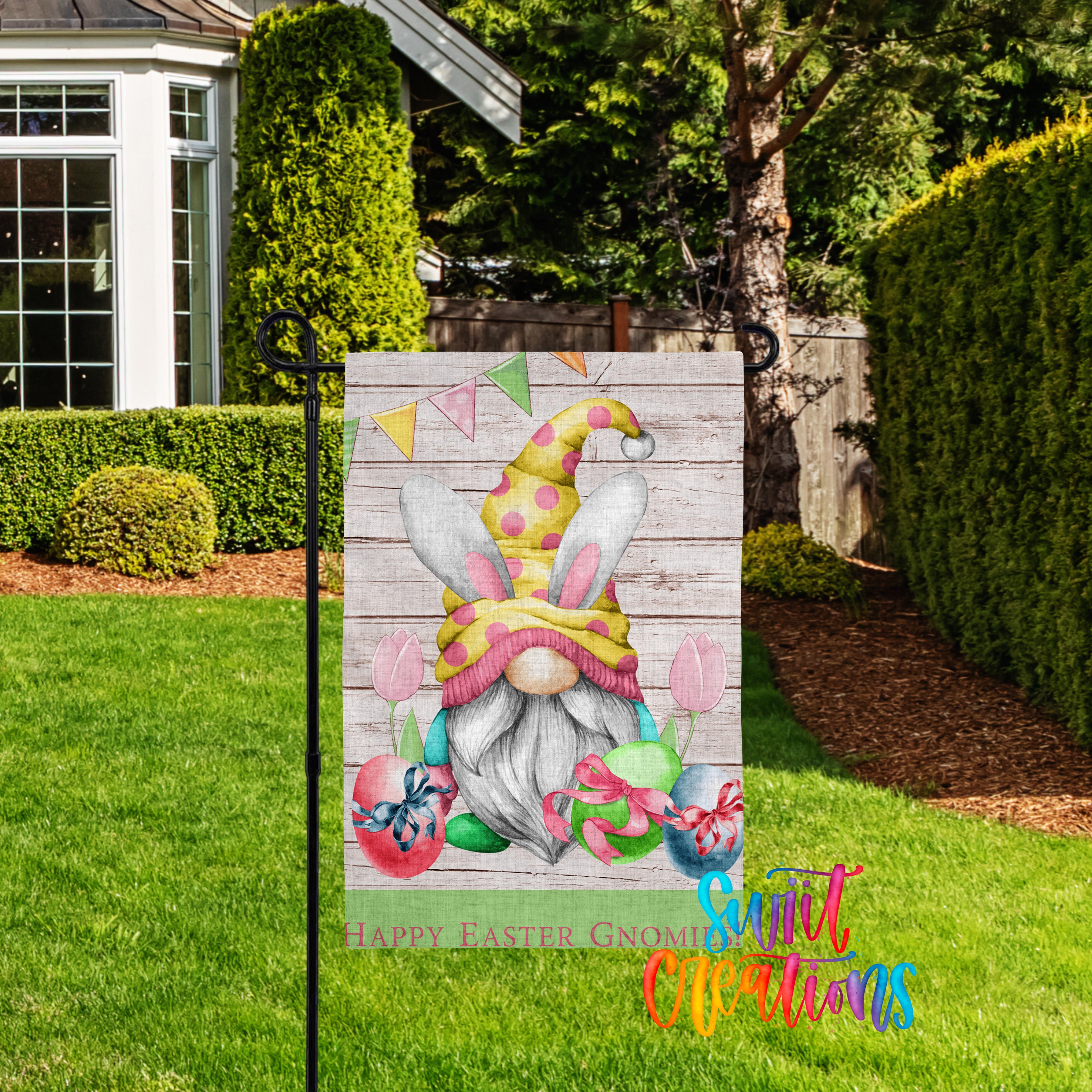 A garden sign featuring a gnome wearing a yellow hat with pink ears and holding a bunch of colorful Easter eggs, surrounded by a festive Easter-themed design.