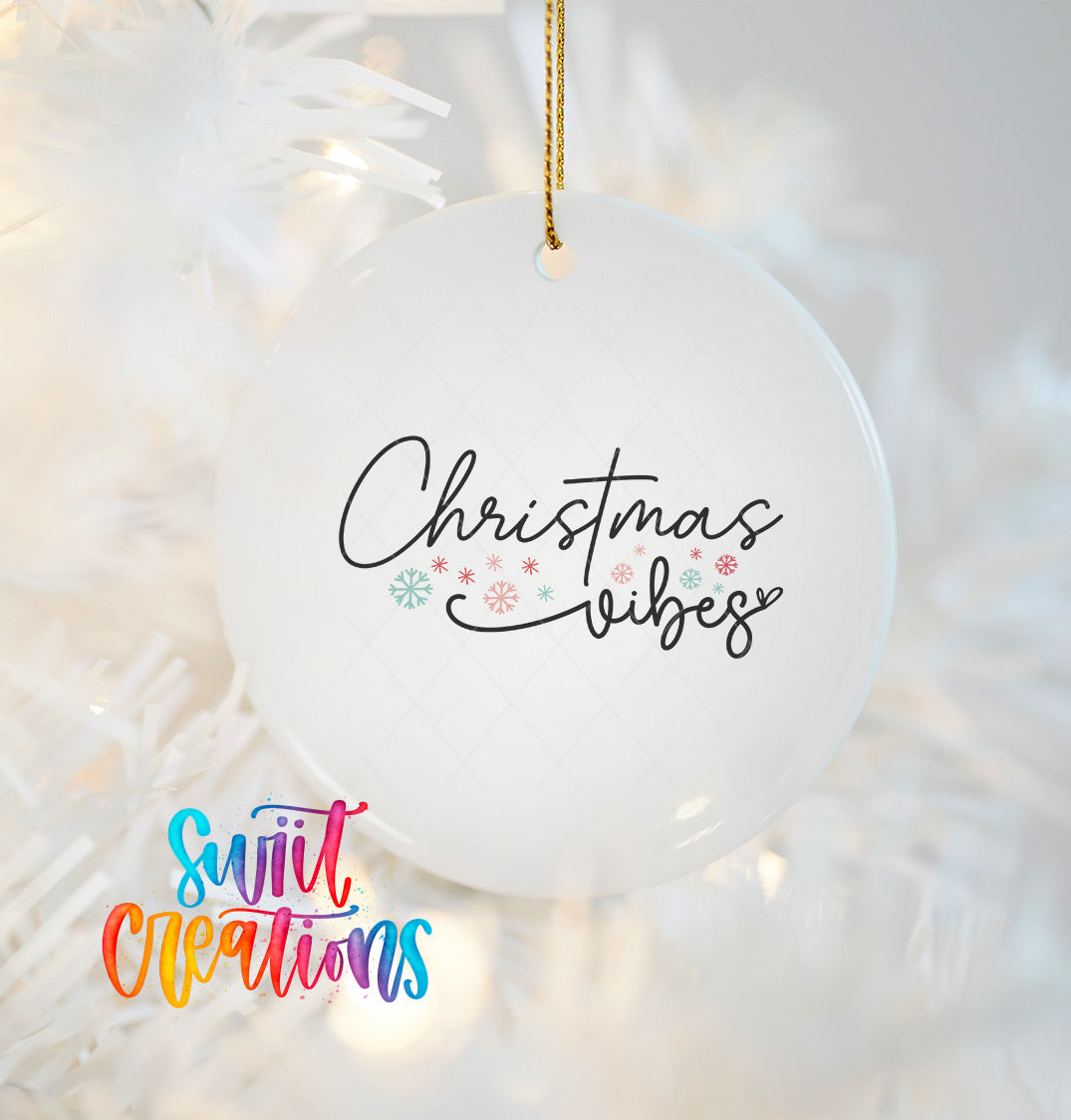 A white Christmas ornament with the text "Christmas vibes" written on it, hanging on a white background with a colorful text overlay that says "Swit Creations".