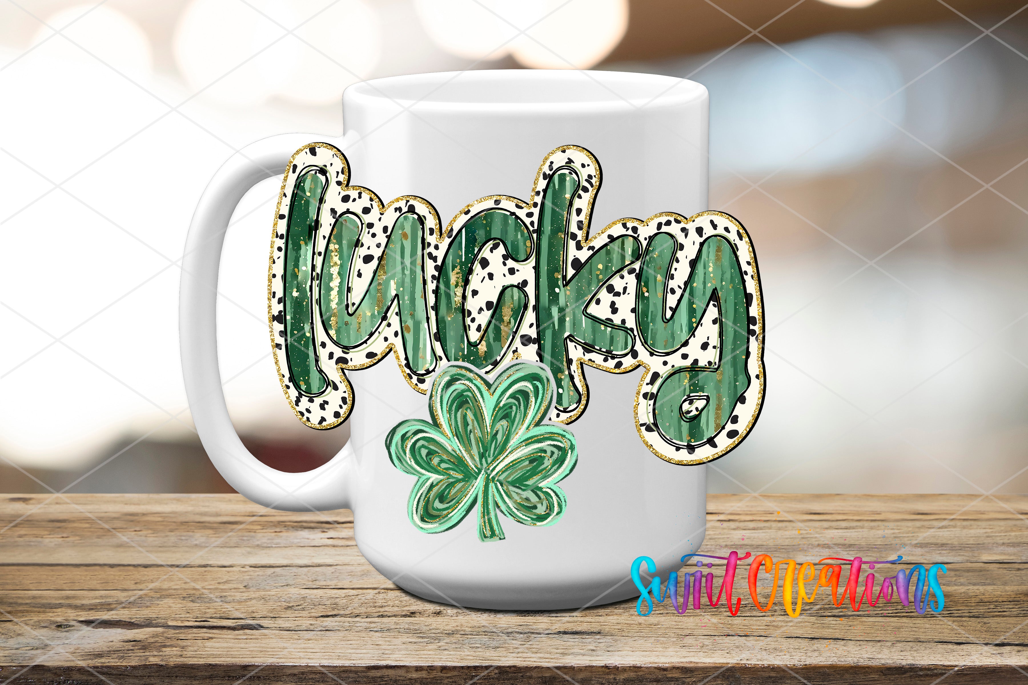 A white ceramic mug with the word "Lucky" written on it, along with a cloverleaf design.