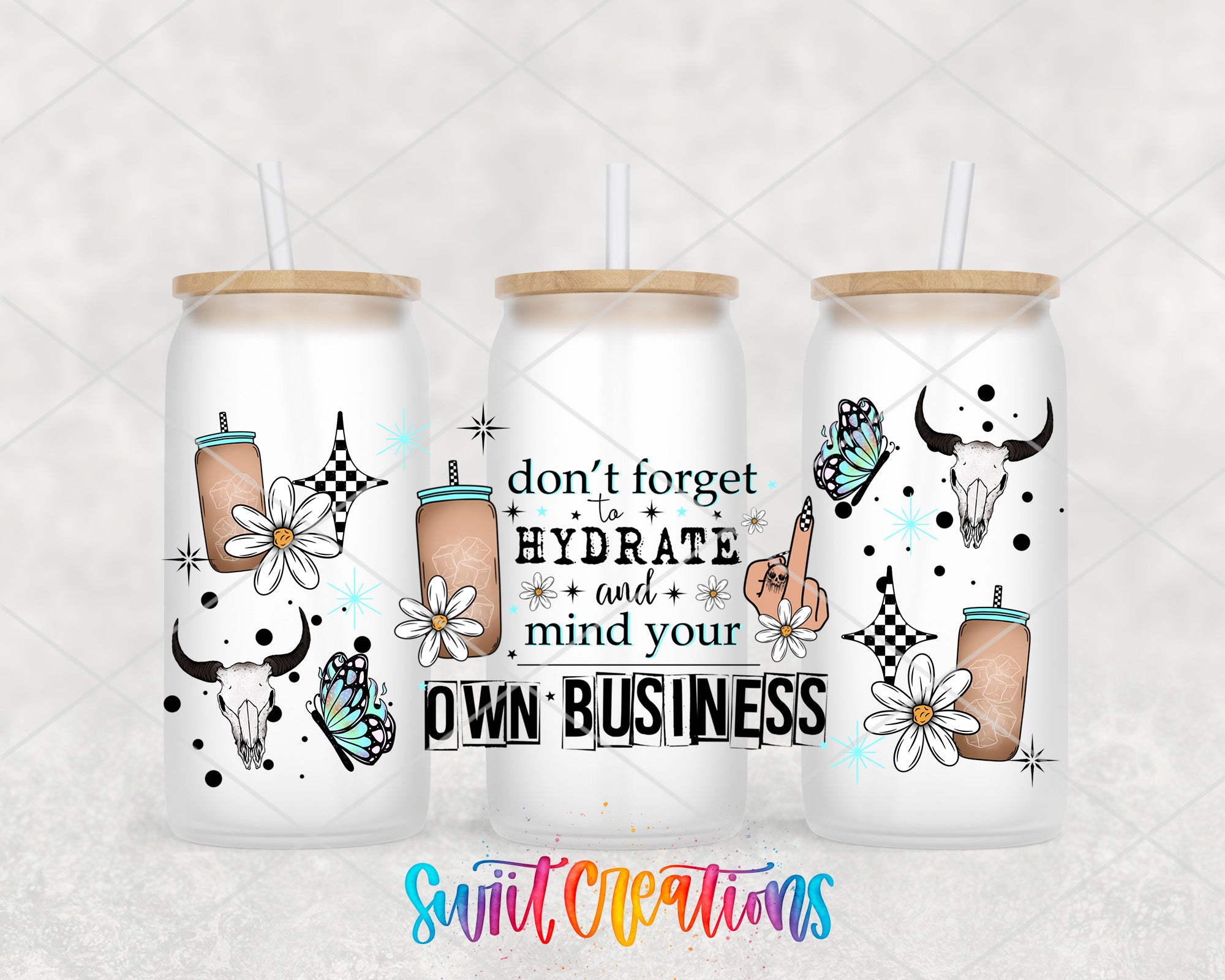 three white tumblers with various designs and text on them.