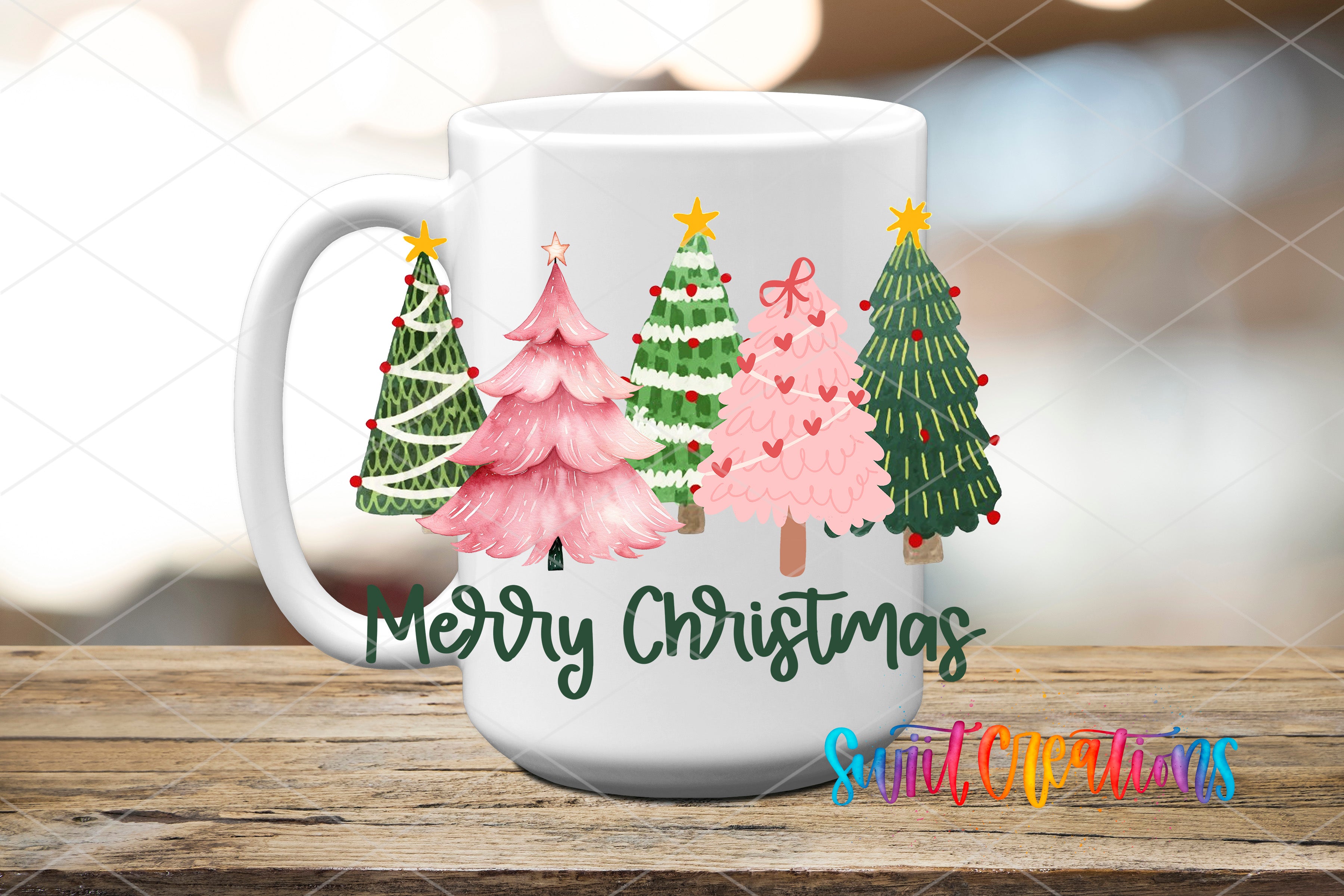 A white mug with a festive Christmas tree design on it, featuring various colored trees and the text "Merry Christmas" written on it.