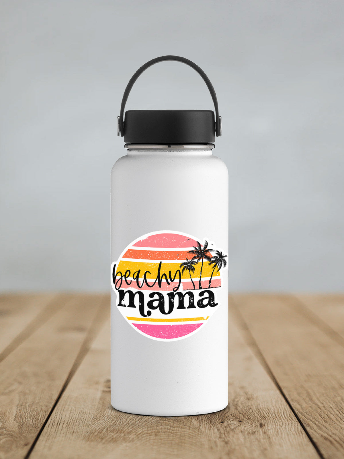 a white water bottle sitting on top of a wooden table