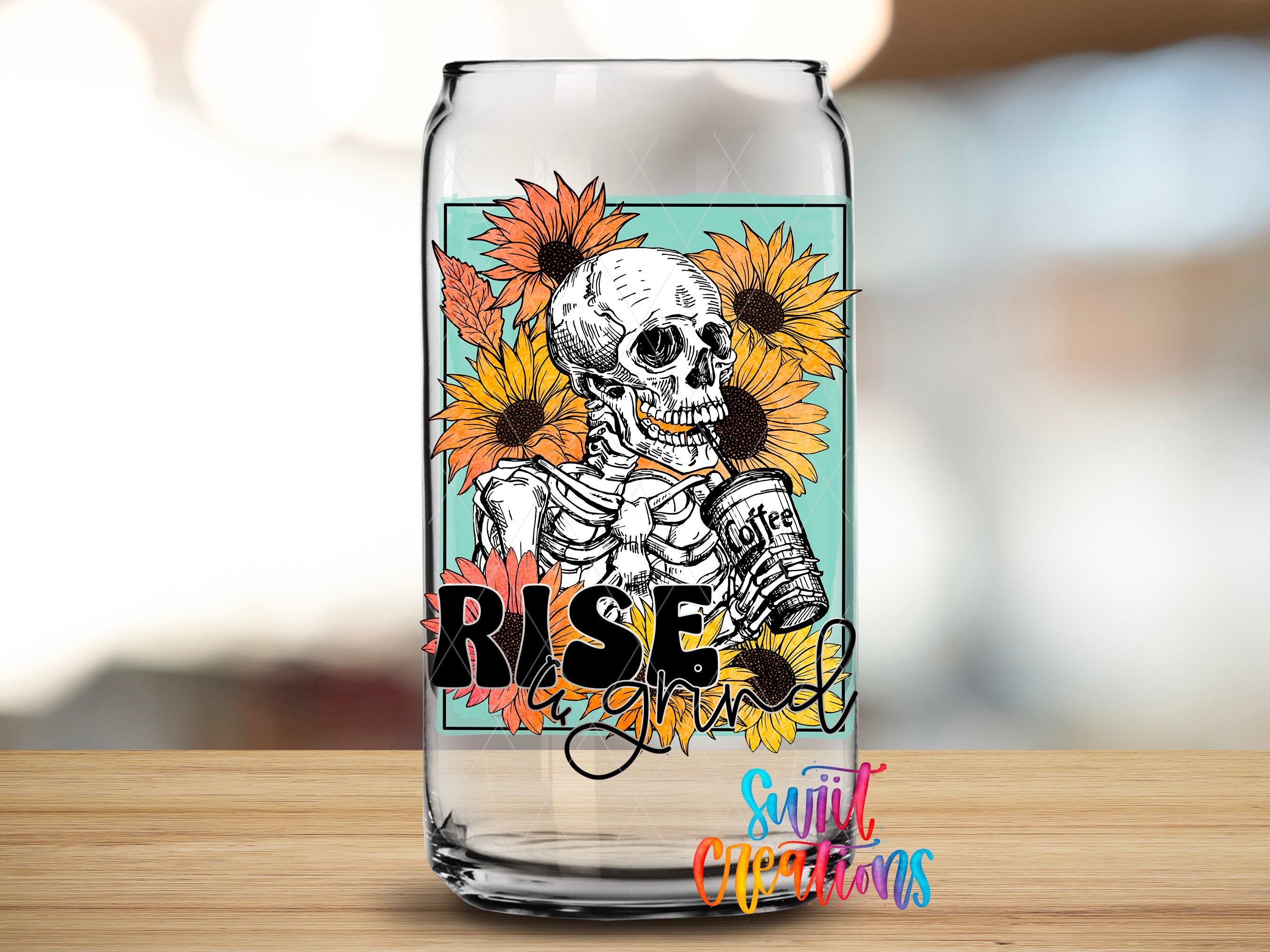 A glass can with a colorful design featuring a skeleton holding a coffee cup, surrounded by sunflowers.