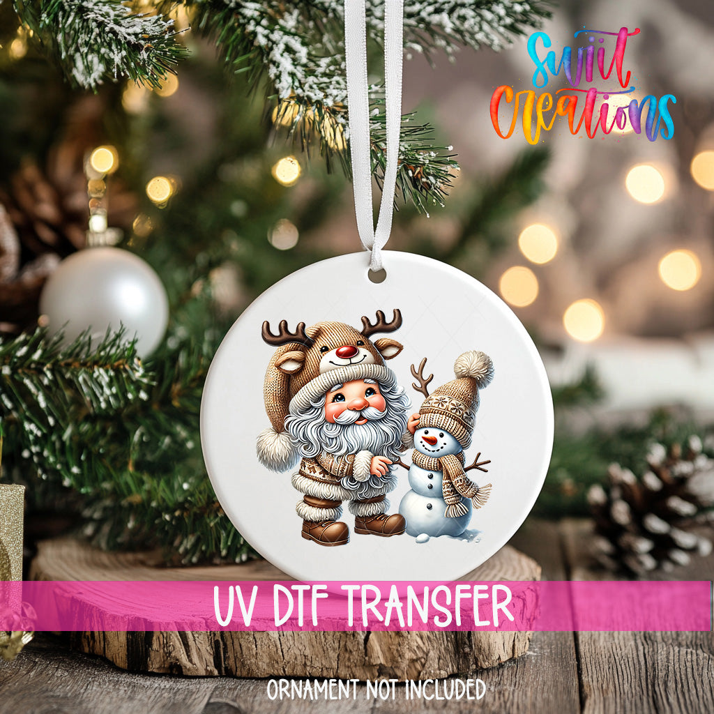 A Christmas ornament featuring Santa Claus and a snowman, with the text "UV Dtf Transfer" and "Ornamment not included" indicating that the ornament is not included in the image.