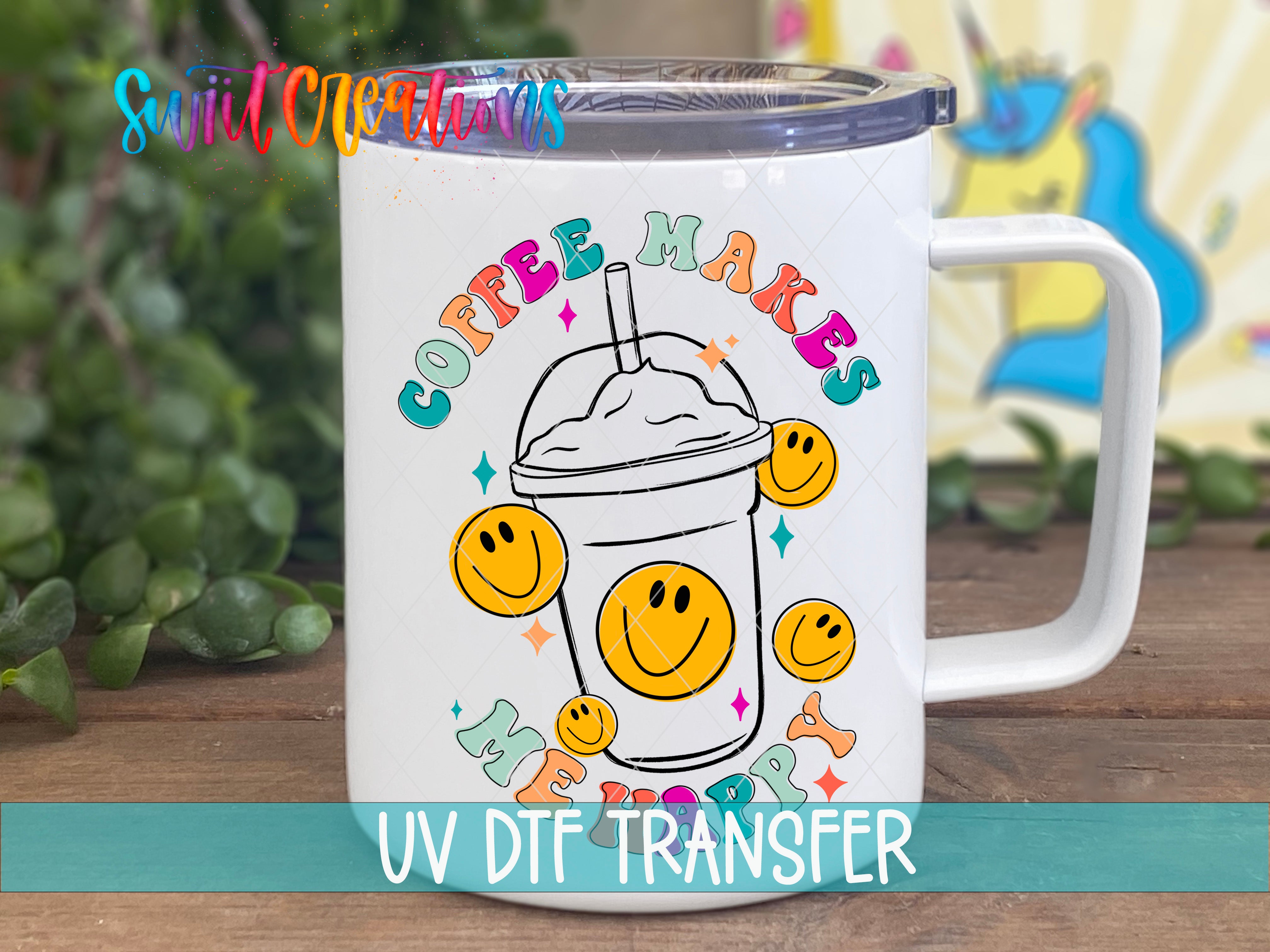 A white mug with a colorful design featuring a coffee cup with a straw and smiley faces, along with the text "COFFEE MAKES ME HAPPY" and "UV Dtf Transfer".