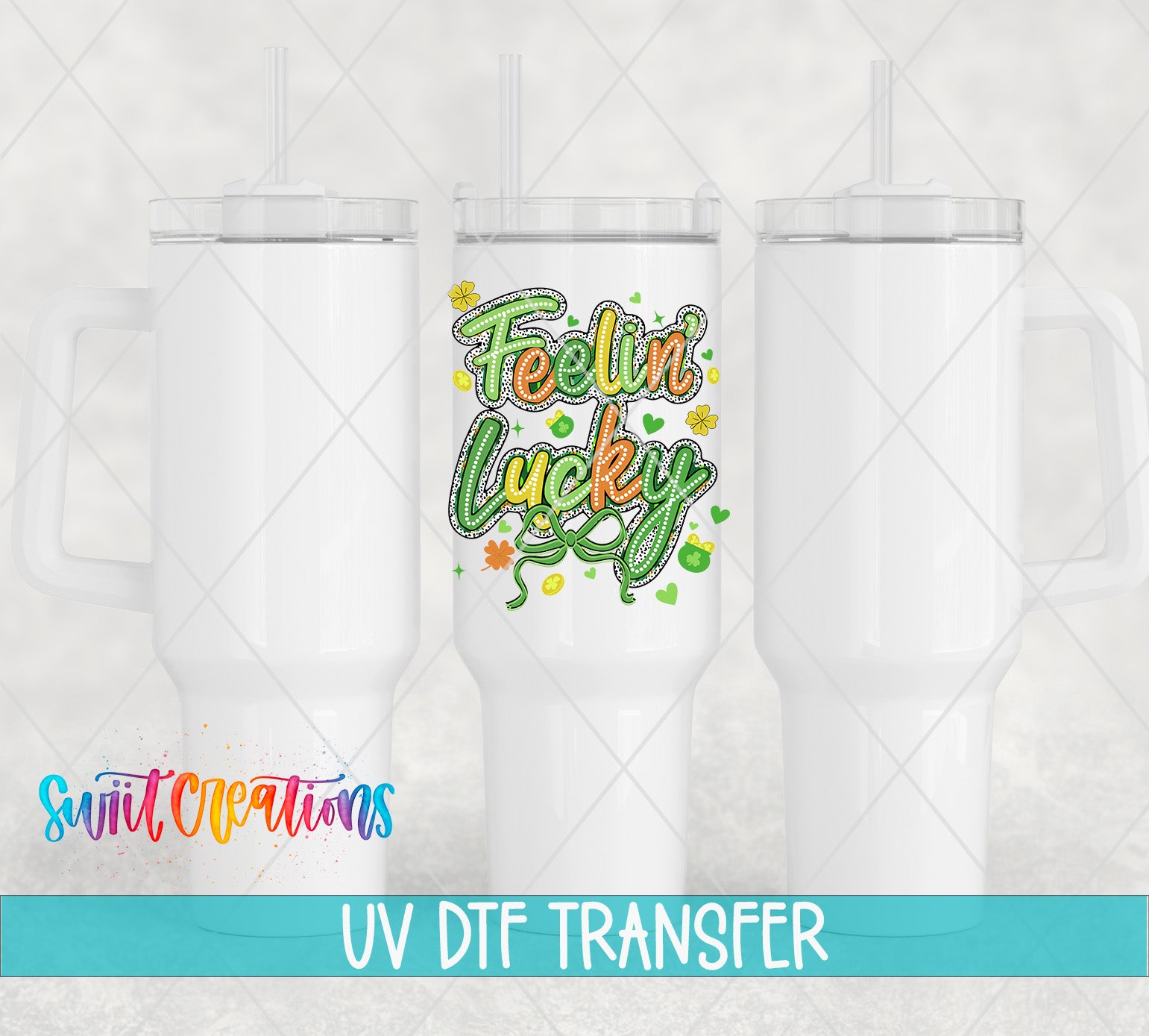 three white tumblers with a colorful design on the front, including the text "Feelin' Lucky" and various decorative elements.