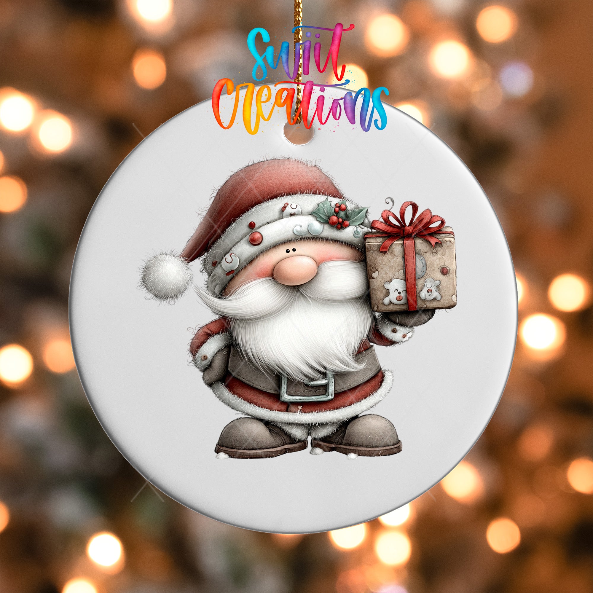 A white ornament featuring a cartoon Santa Claus holding a gift box, with a colorful background of Christmas lights.