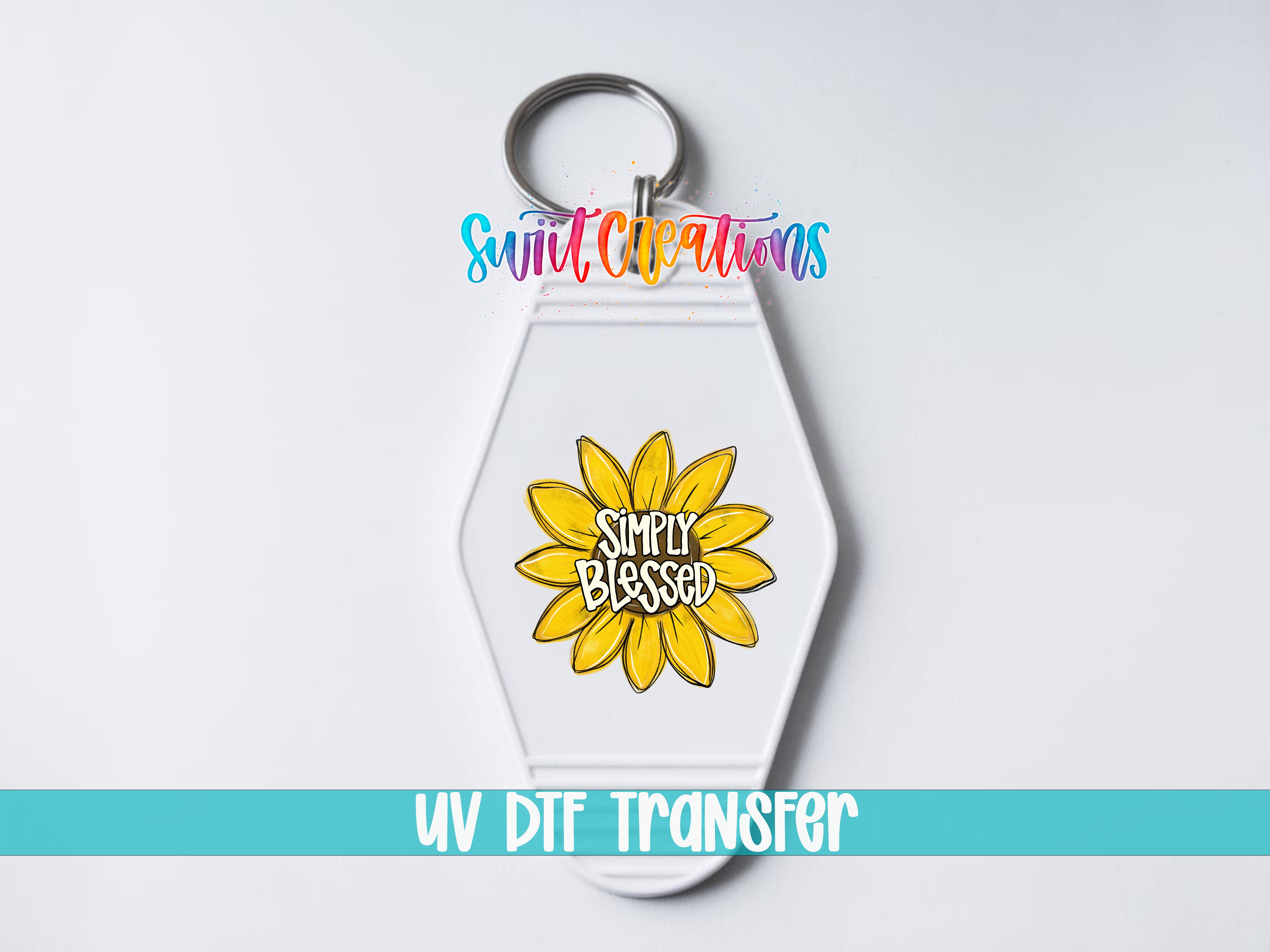 A keychain with a sunflower design and the text "Simply Blessed" printed on it.