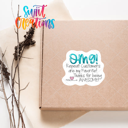 a box with a sticker on it sitting next to a plant