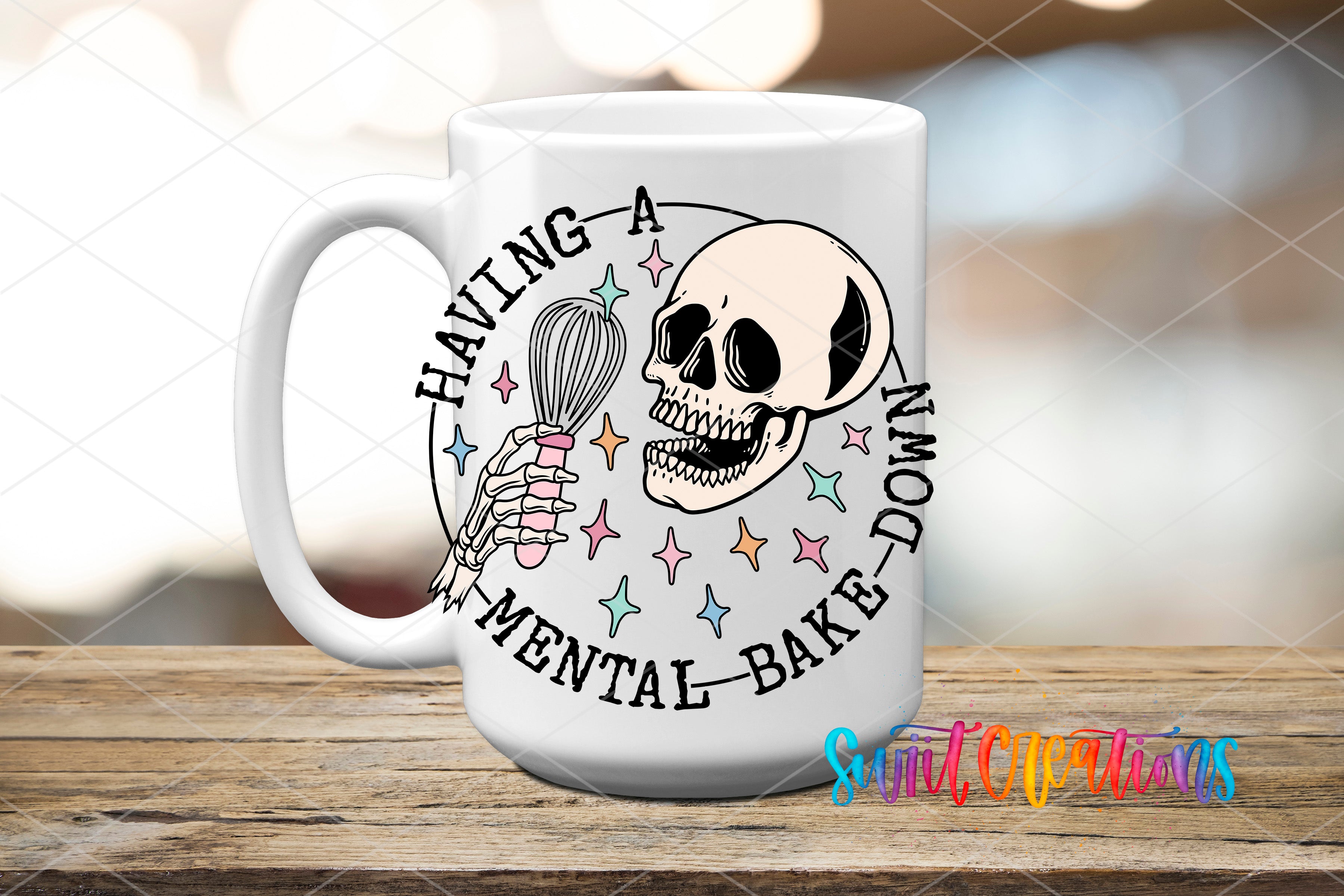 A white mug with a graphic design featuring a skull holding a whisk and the text "Having a mental bake down" around it.