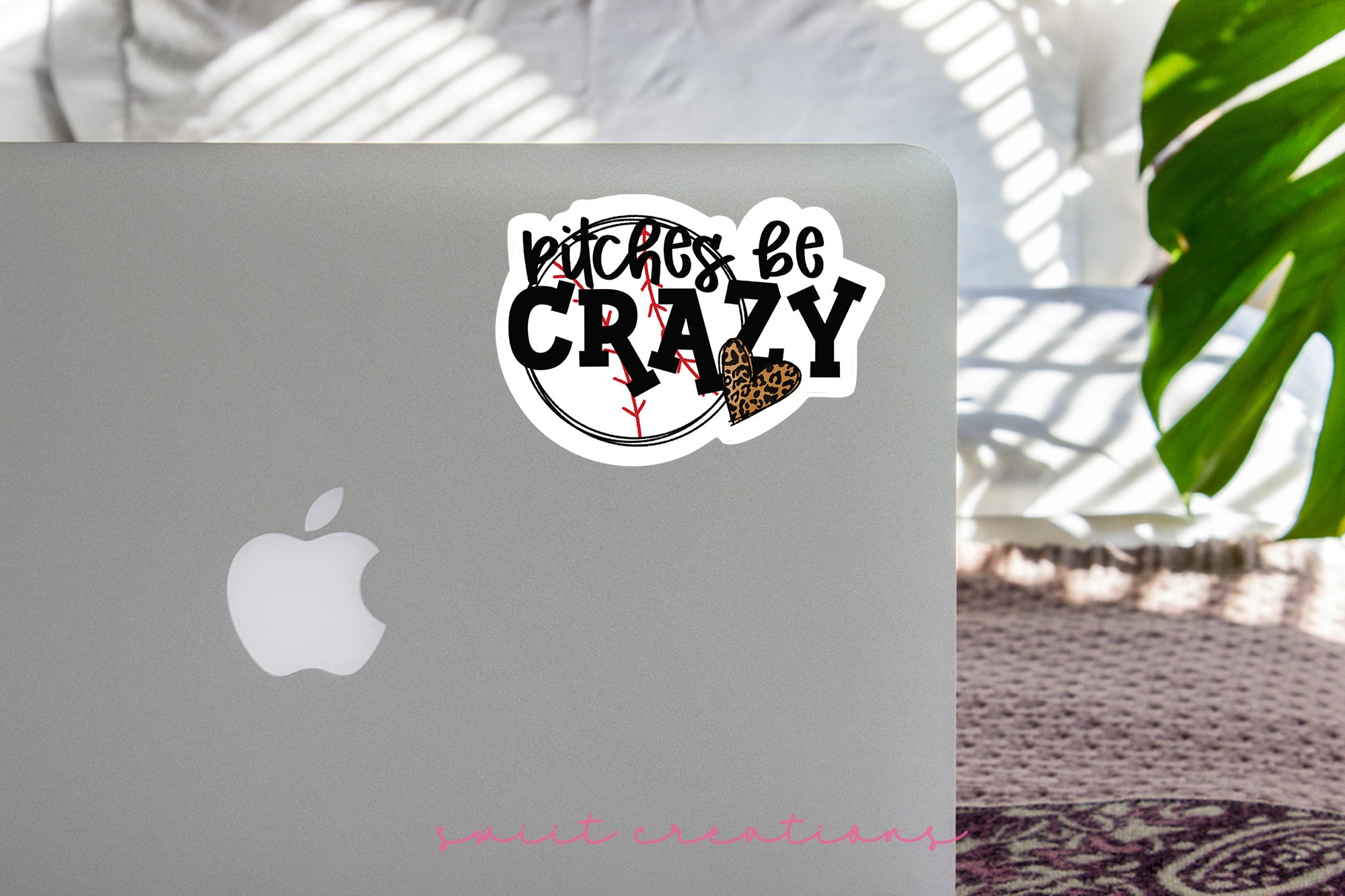 a laptop with a sticker on it sitting on a table