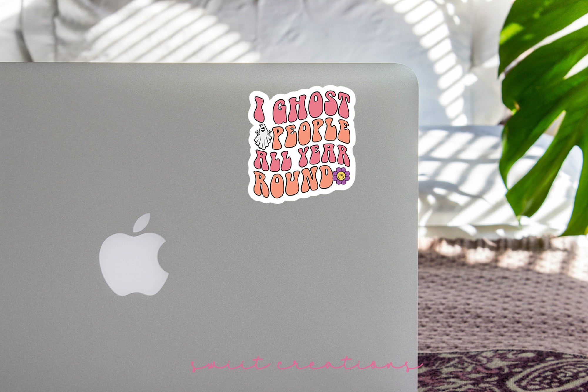 a laptop with a sticker on it sitting on a table