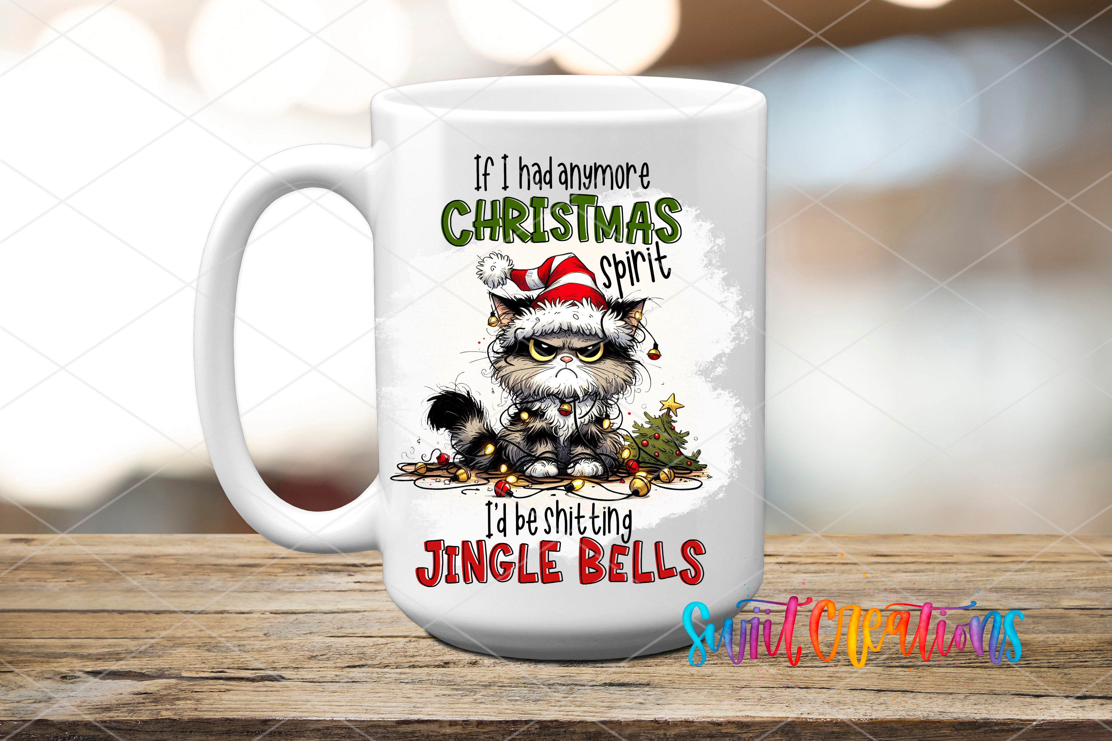 A white ceramic mug with a humorous Christmas-themed design featuring a cat wearing a Santa hat and the text "If I had anymore Christmas spirit, I'd be shitting Jingle bells".