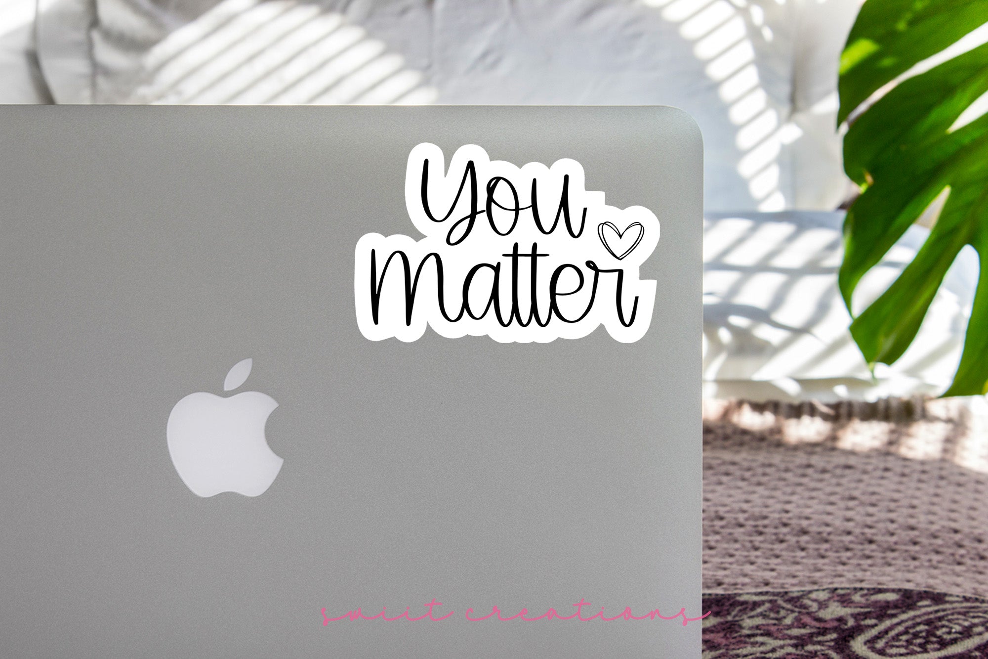 a laptop with a sticker that says you matter
