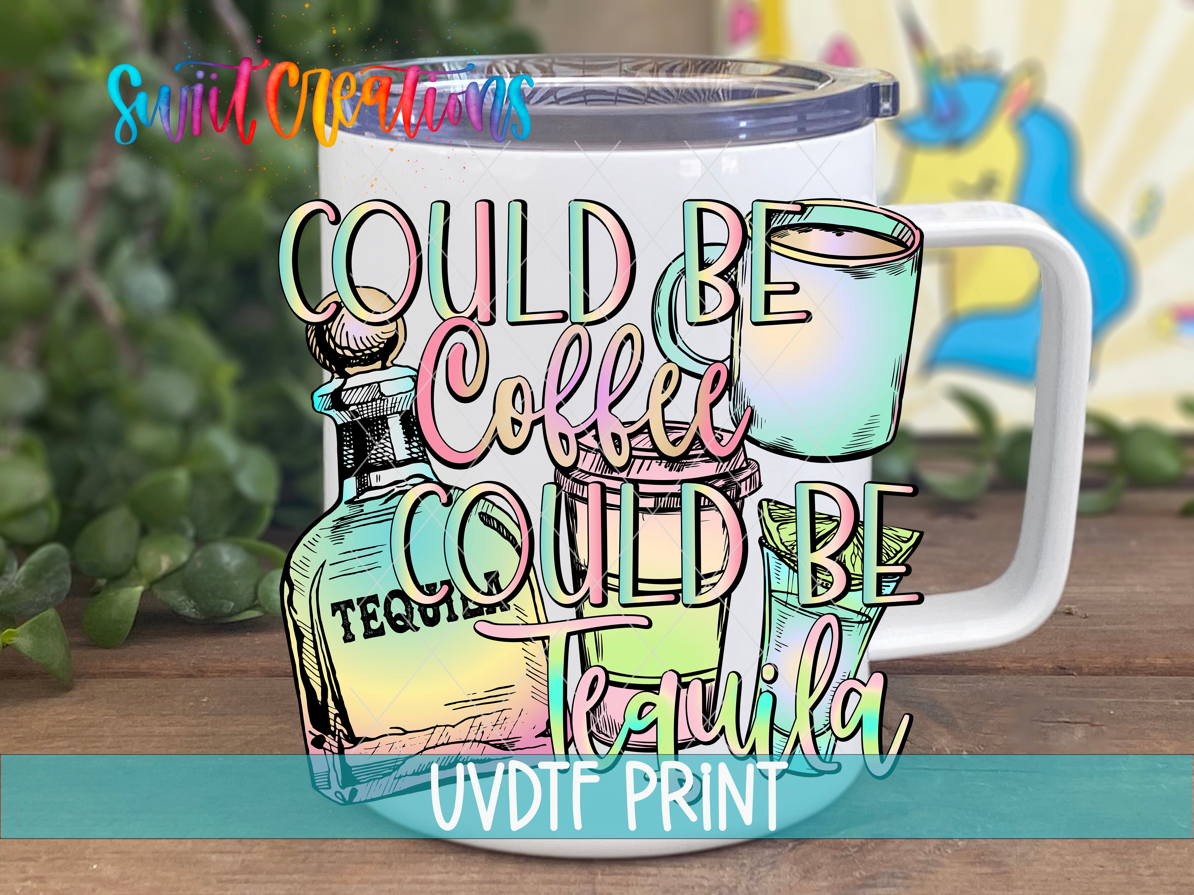 A colorful mug with a printed text design that says "COULD BE COFFEE COULD BE TRAUMA" along with illustrations of tequila bottles and glasses.