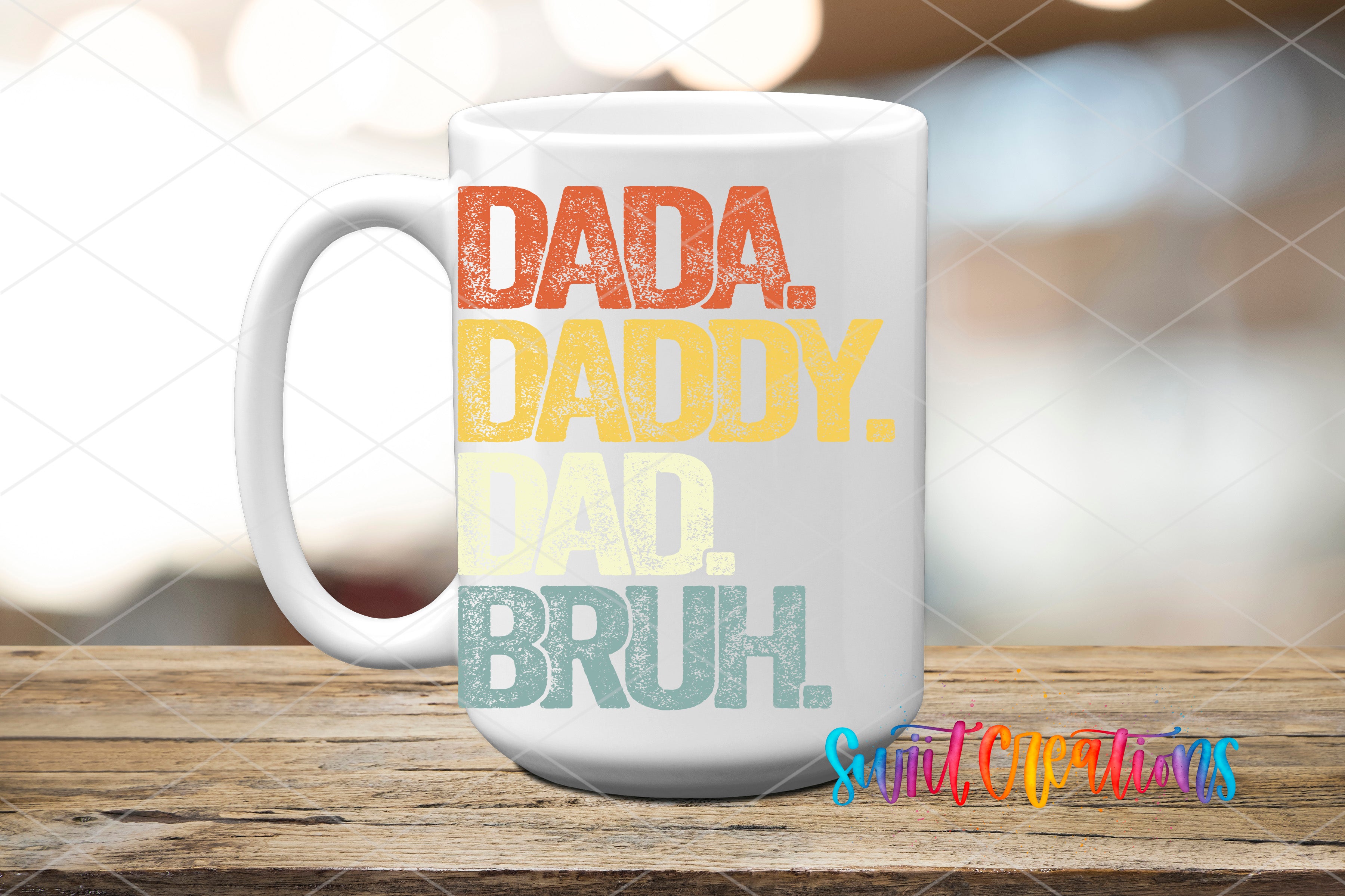 A white mug with text printed on it, sitting on a wooden surface.