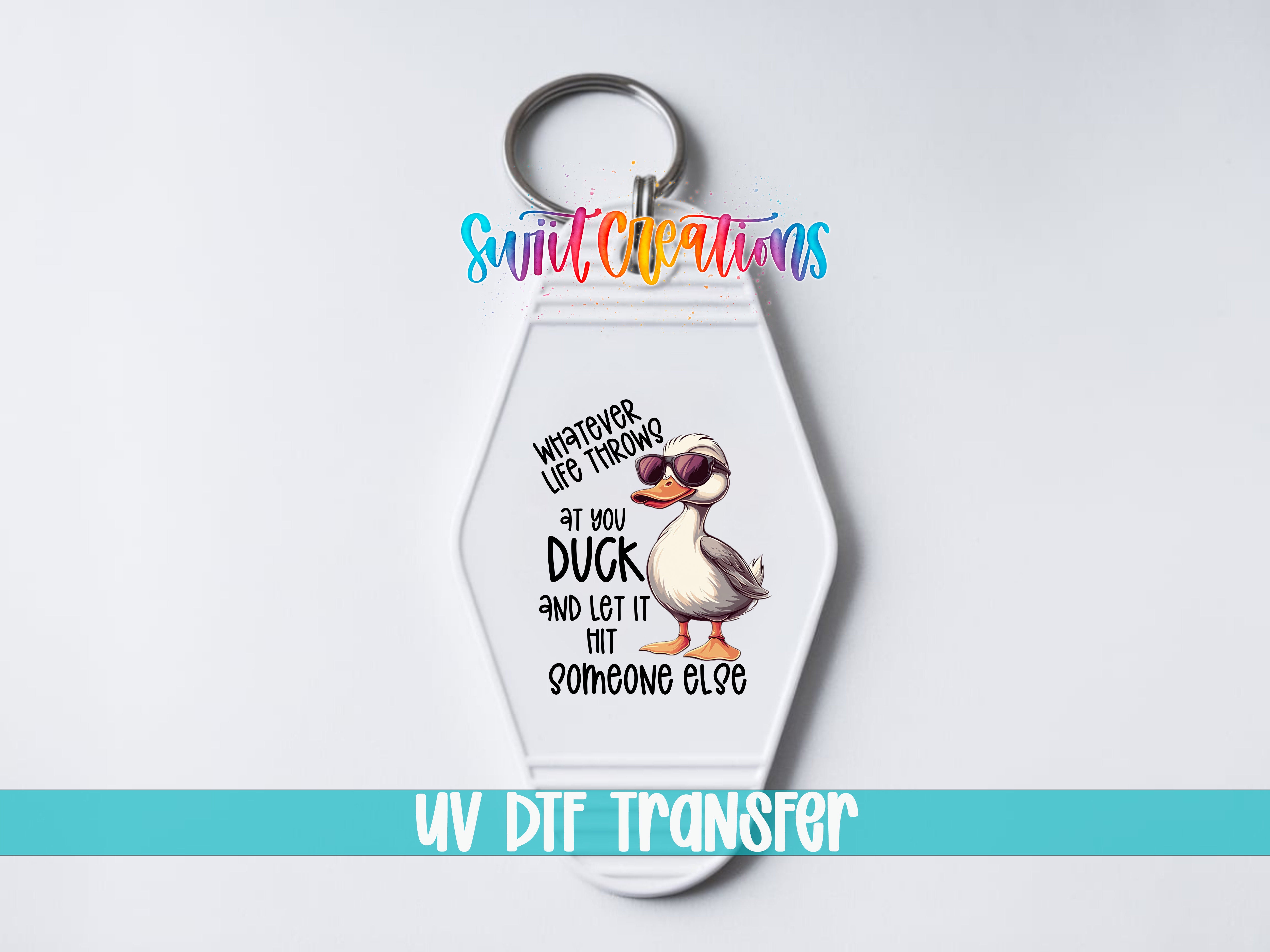 A keychain with a cartoon duck and text that says "Whatever life throws at you, duck and let it hit someone else".