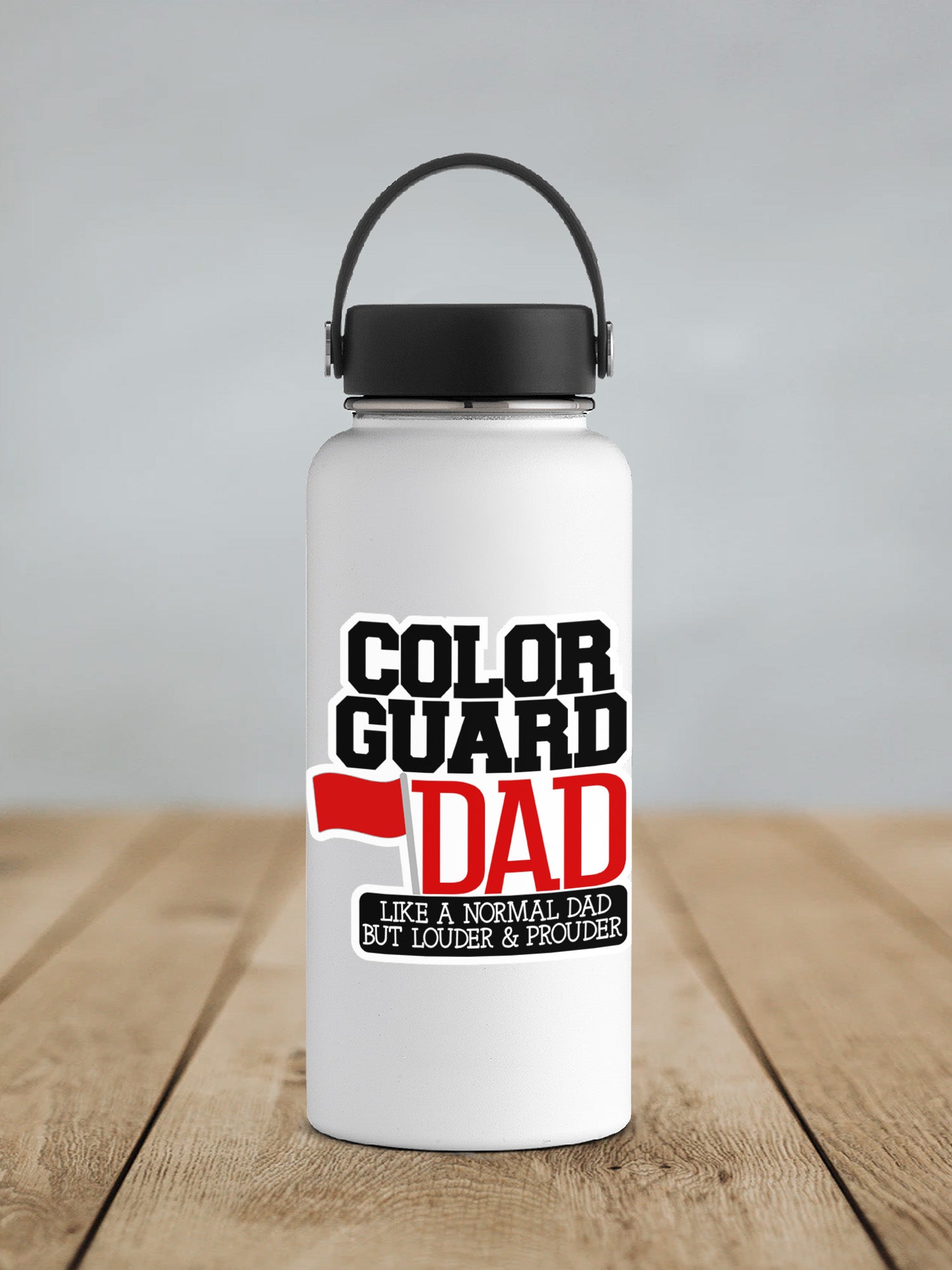 a white water bottle sitting on top of a wooden table