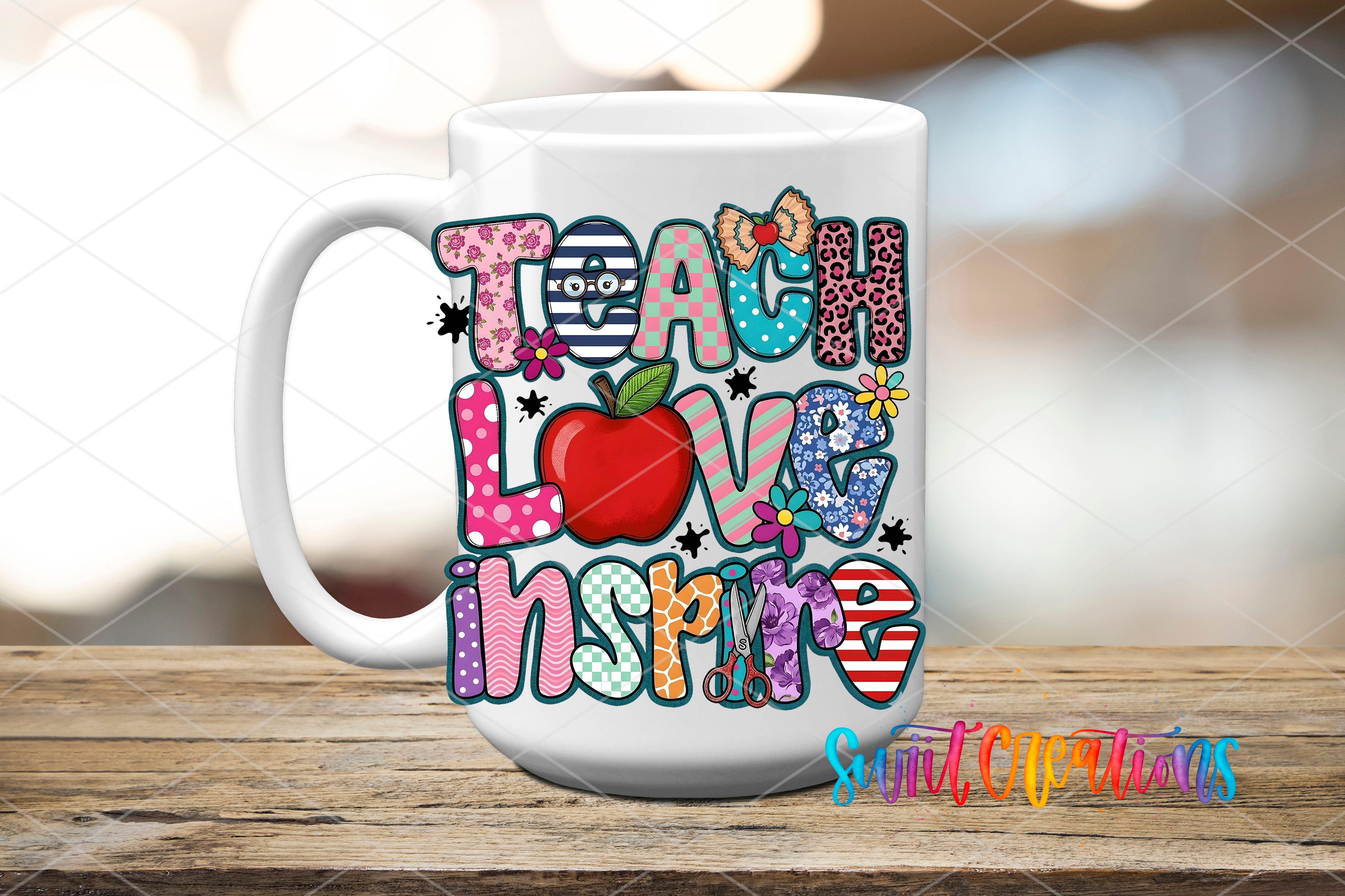 A white mug with colorful text and illustrations that say "Teach Love Inspire" on it.