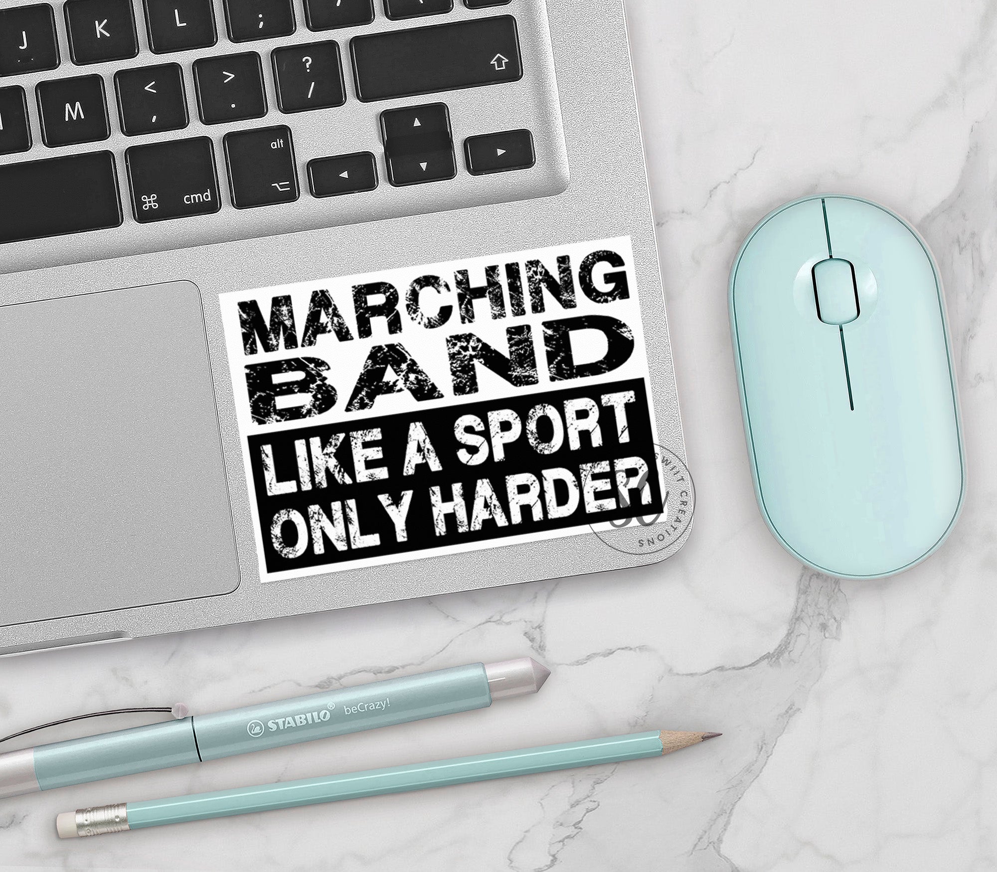a sticker that says marching band like a sport only harder